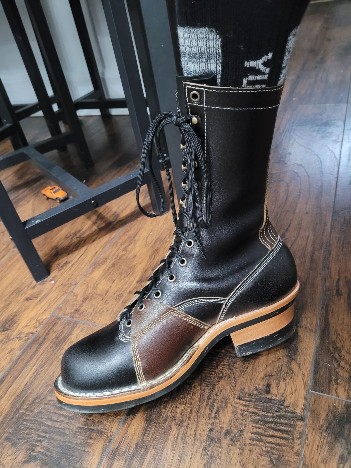 Photo by Schmittworks on September 23, 2024 of the Frank's Boots Lace-To-Toe in Horween Black Waxed Flesh & Horween Cinnamon Waxed Flesh.