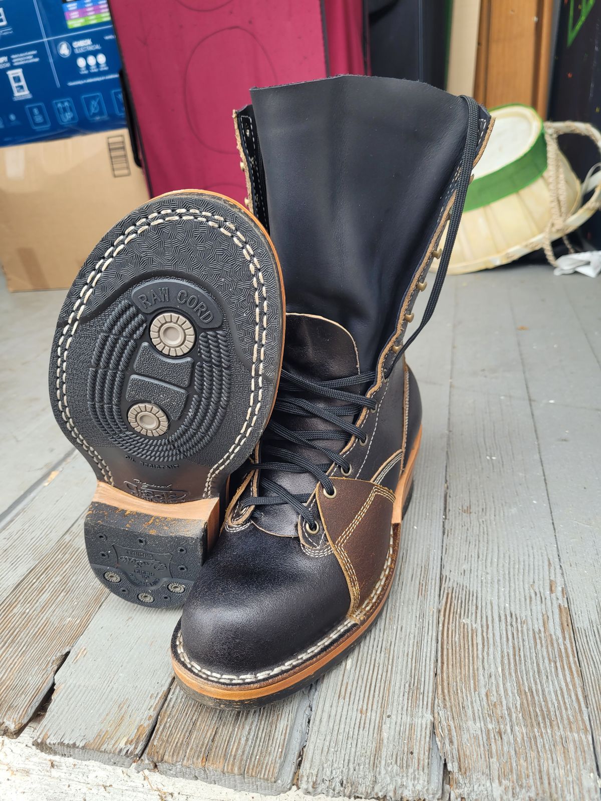 Photo by Schmittworks on September 24, 2024 of the Frank's Boots Lace-To-Toe in Horween Black Waxed Flesh & Horween Cinnamon Waxed Flesh.