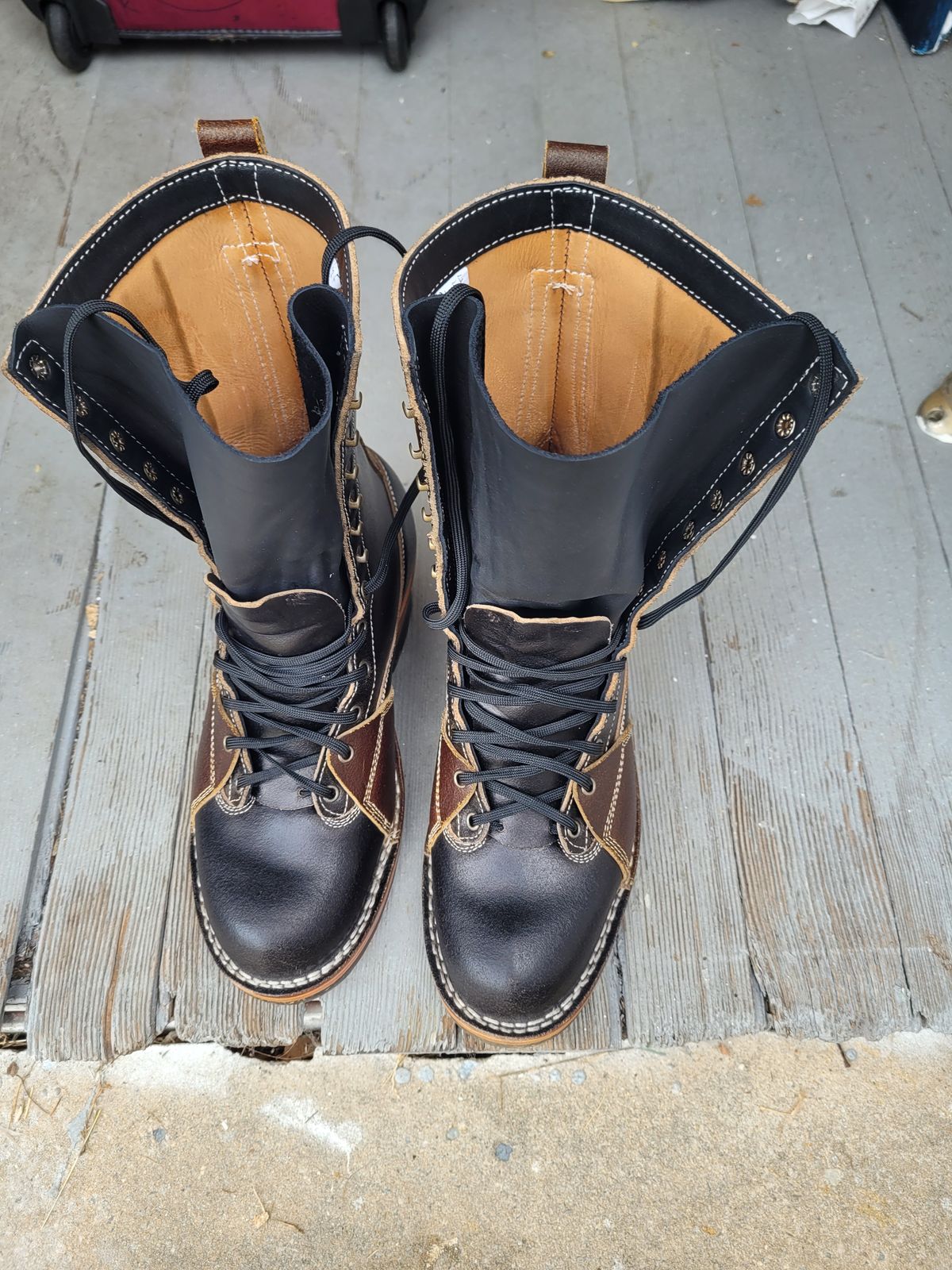 Photo by Schmittworks on September 24, 2024 of the Frank's Boots Lace-To-Toe in Horween Black Waxed Flesh & Horween Cinnamon Waxed Flesh.