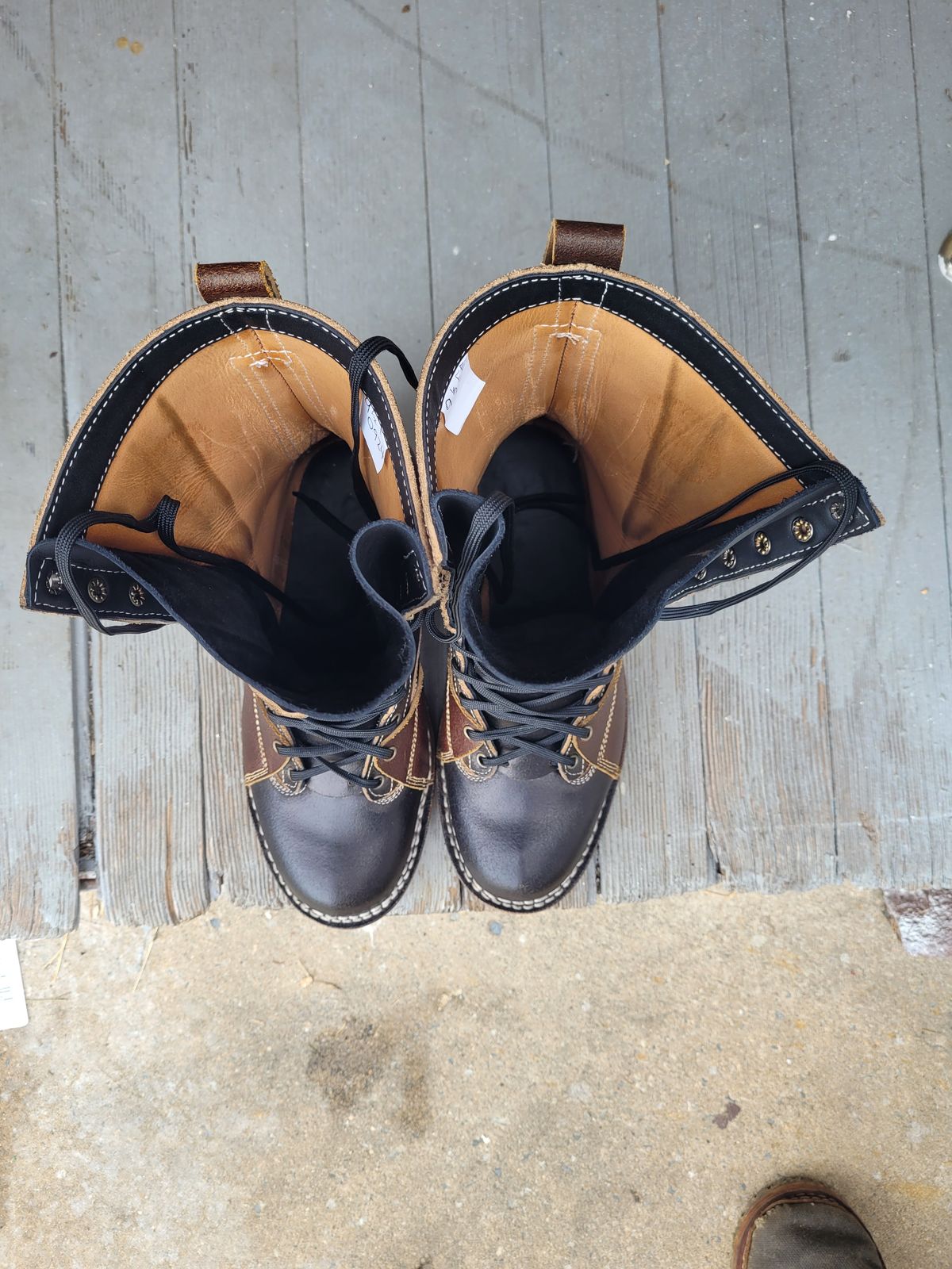 Photo by Schmittworks on September 24, 2024 of the Frank's Boots Lace-To-Toe in Horween Black Waxed Flesh & Horween Cinnamon Waxed Flesh.