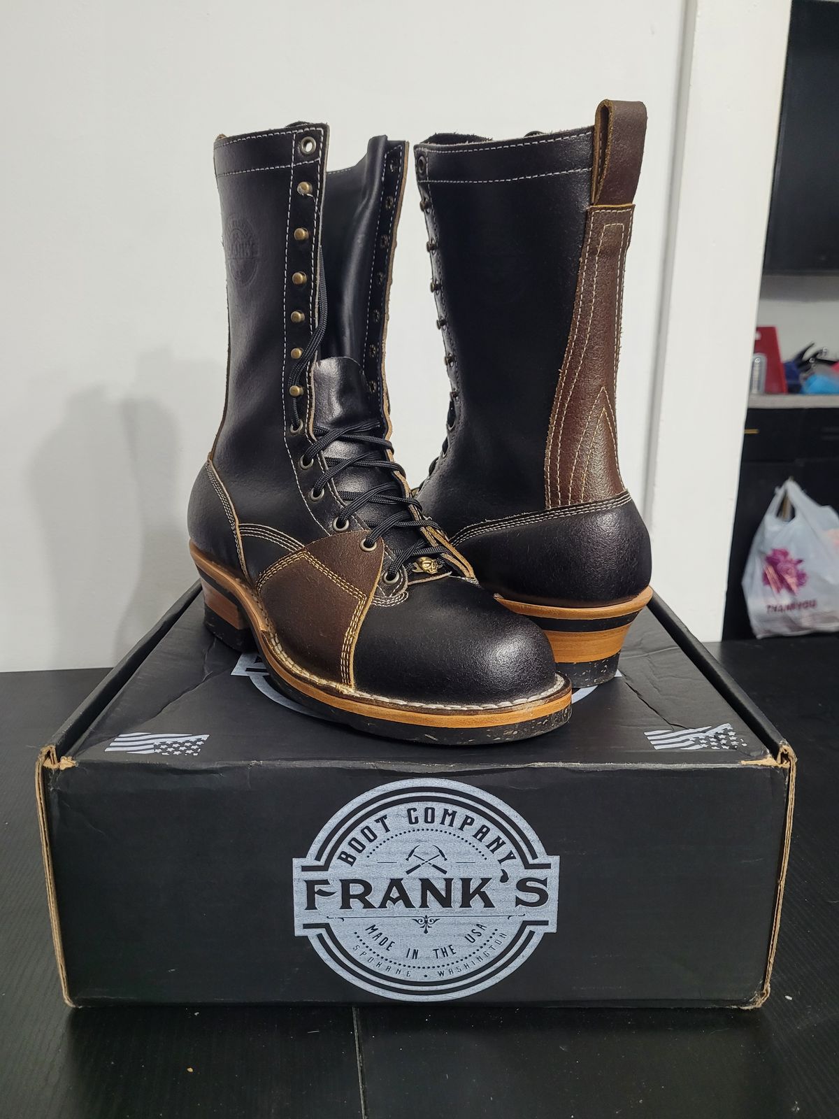 Photo by Schmittworks on October 1, 2024 of the Frank's Boots Lace-To-Toe in Horween Black Waxed Flesh & Horween Cinnamon Waxed Flesh.