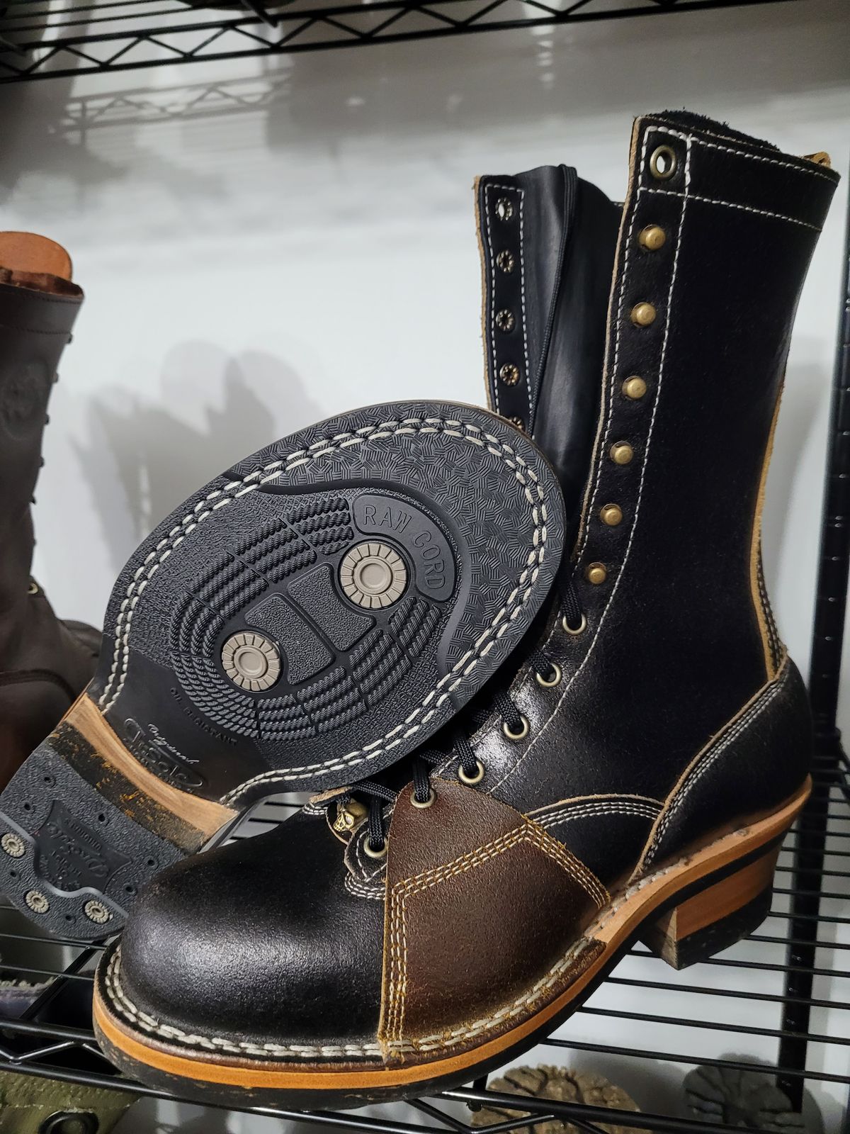 Photo by Schmittworks on October 1, 2024 of the Frank's Boots Lace-To-Toe in Horween Black Waxed Flesh & Horween Cinnamon Waxed Flesh.