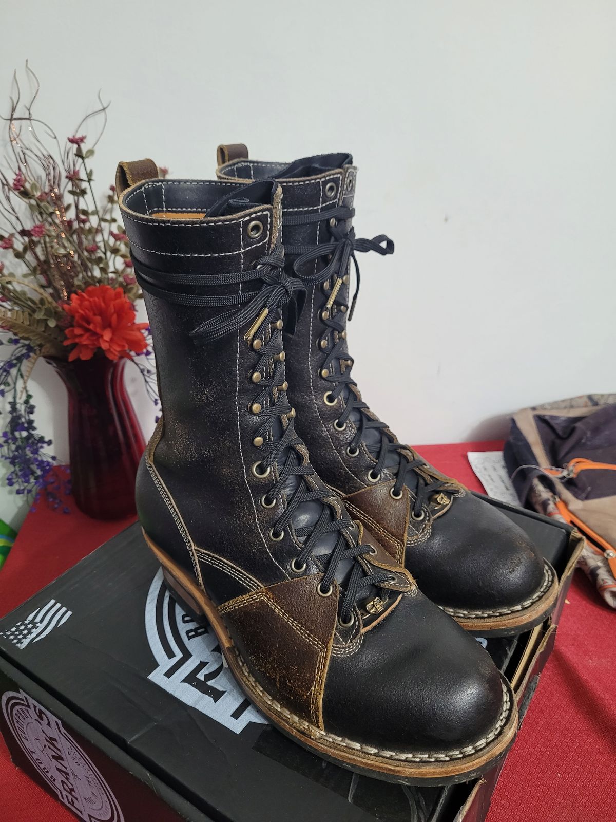 Photo by Schmittworks on November 4, 2024 of the Frank's Boots Lace-To-Toe in Horween Black Waxed Flesh & Horween Cinnamon Waxed Flesh.