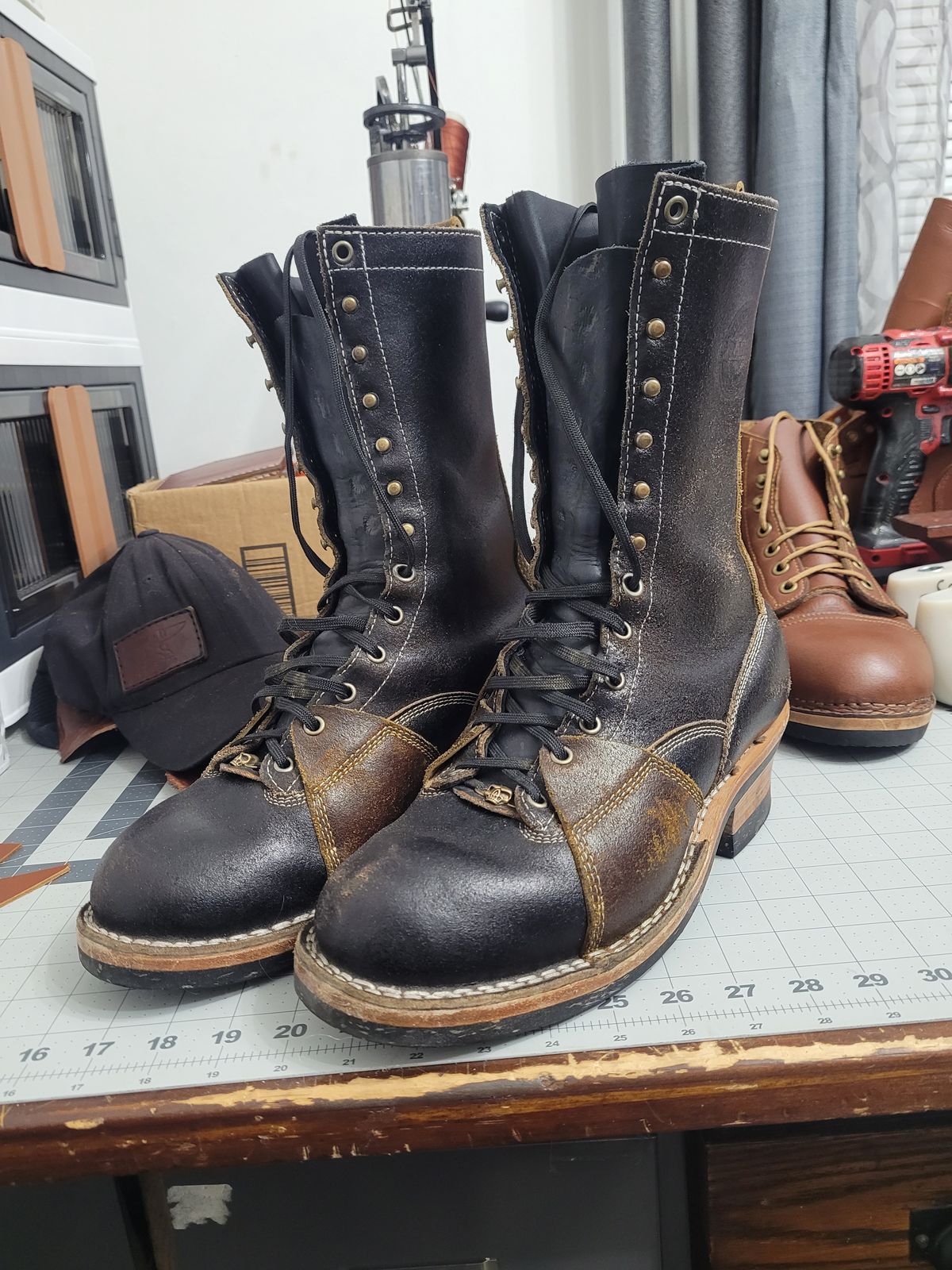 Photo by Schmittworks on November 19, 2024 of the Frank's Boots Lace-To-Toe in Horween Black Waxed Flesh & Horween Cinnamon Waxed Flesh.