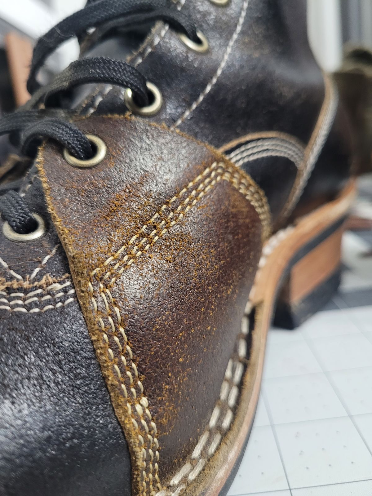 Photo by Schmittworks on November 19, 2024 of the Frank's Boots Lace-To-Toe in Horween Black Waxed Flesh & Horween Cinnamon Waxed Flesh.
