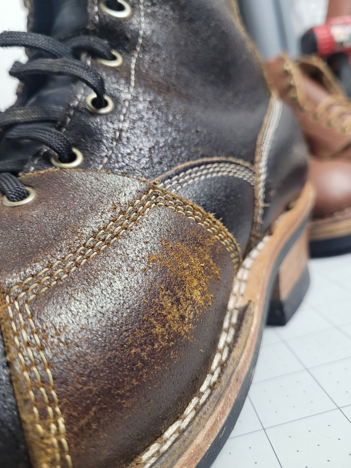 Photo by Schmittworks on November 19, 2024 of the Frank's Boots Lace-To-Toe in Horween Black Waxed Flesh & Horween Cinnamon Waxed Flesh.