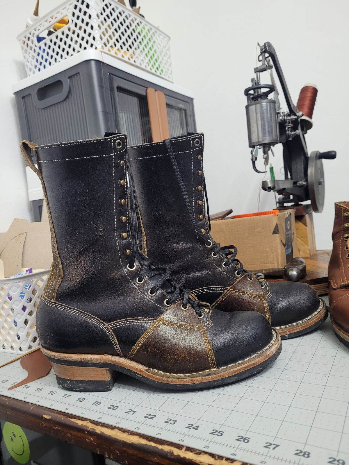 Photo by Schmittworks on November 19, 2024 of the Frank's Boots Lace-To-Toe in Horween Black Waxed Flesh & Horween Cinnamon Waxed Flesh.