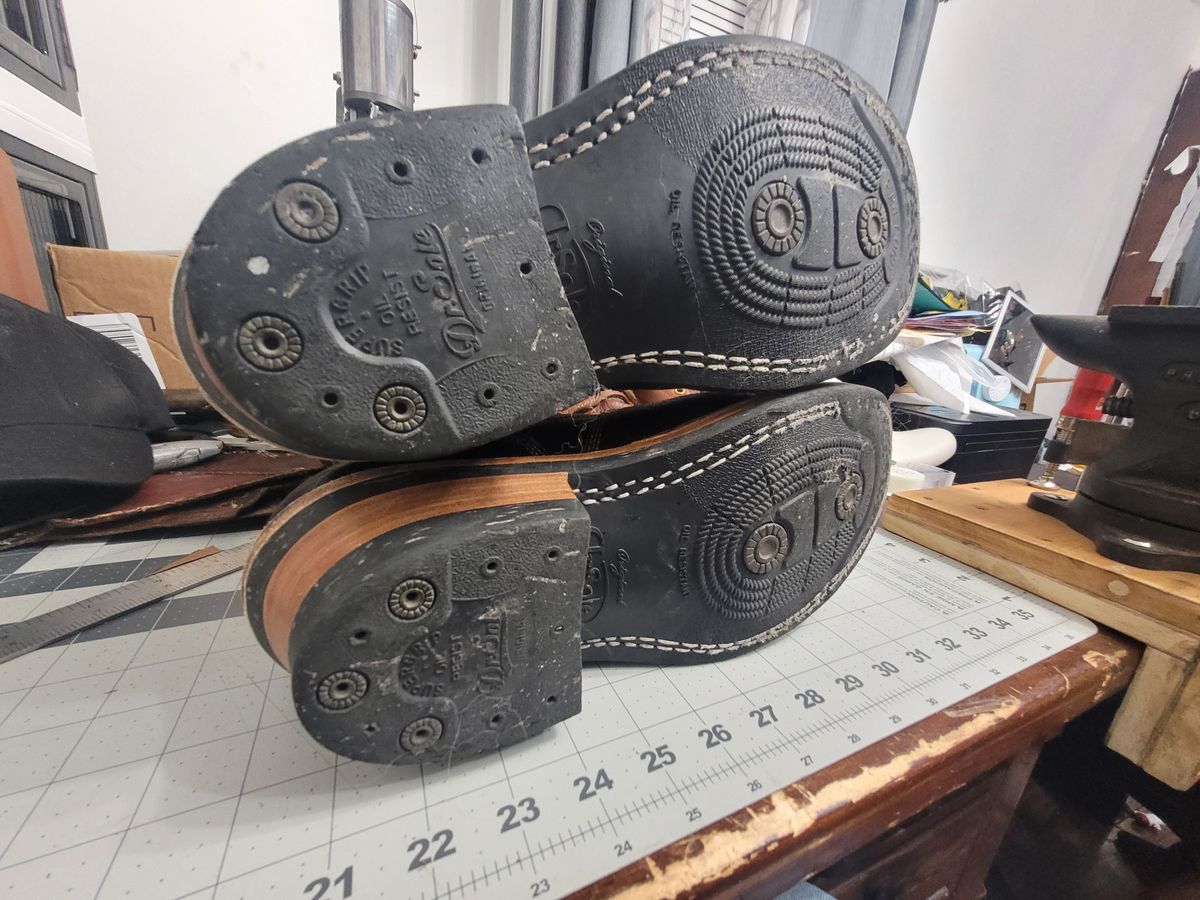 Photo by Schmittworks on November 19, 2024 of the Frank's Boots Lace-To-Toe in Horween Black Waxed Flesh & Horween Cinnamon Waxed Flesh.