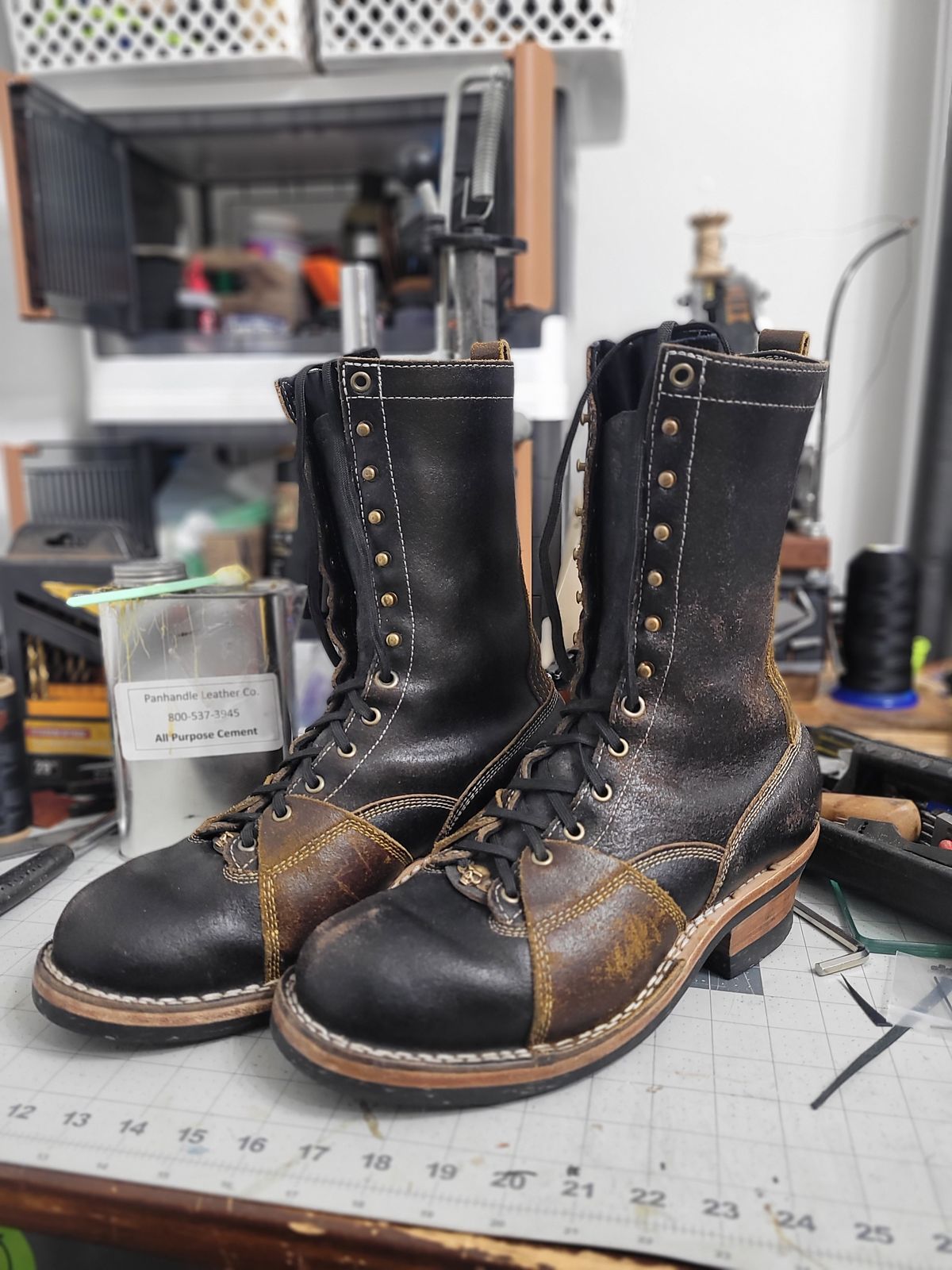 Photo by Schmittworks on January 1, 2025 of the Frank's Boots Lace-To-Toe in Horween Black Waxed Flesh & Horween Cinnamon Waxed Flesh.