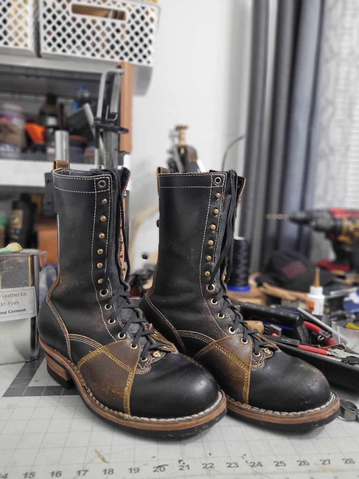 Photo by Schmittworks on January 1, 2025 of the Frank's Boots Lace-To-Toe in Horween Black Waxed Flesh & Horween Cinnamon Waxed Flesh.