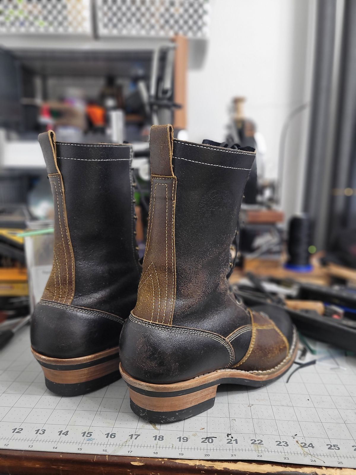 Photo by Schmittworks on January 1, 2025 of the Frank's Boots Lace-To-Toe in Horween Black Waxed Flesh & Horween Cinnamon Waxed Flesh.