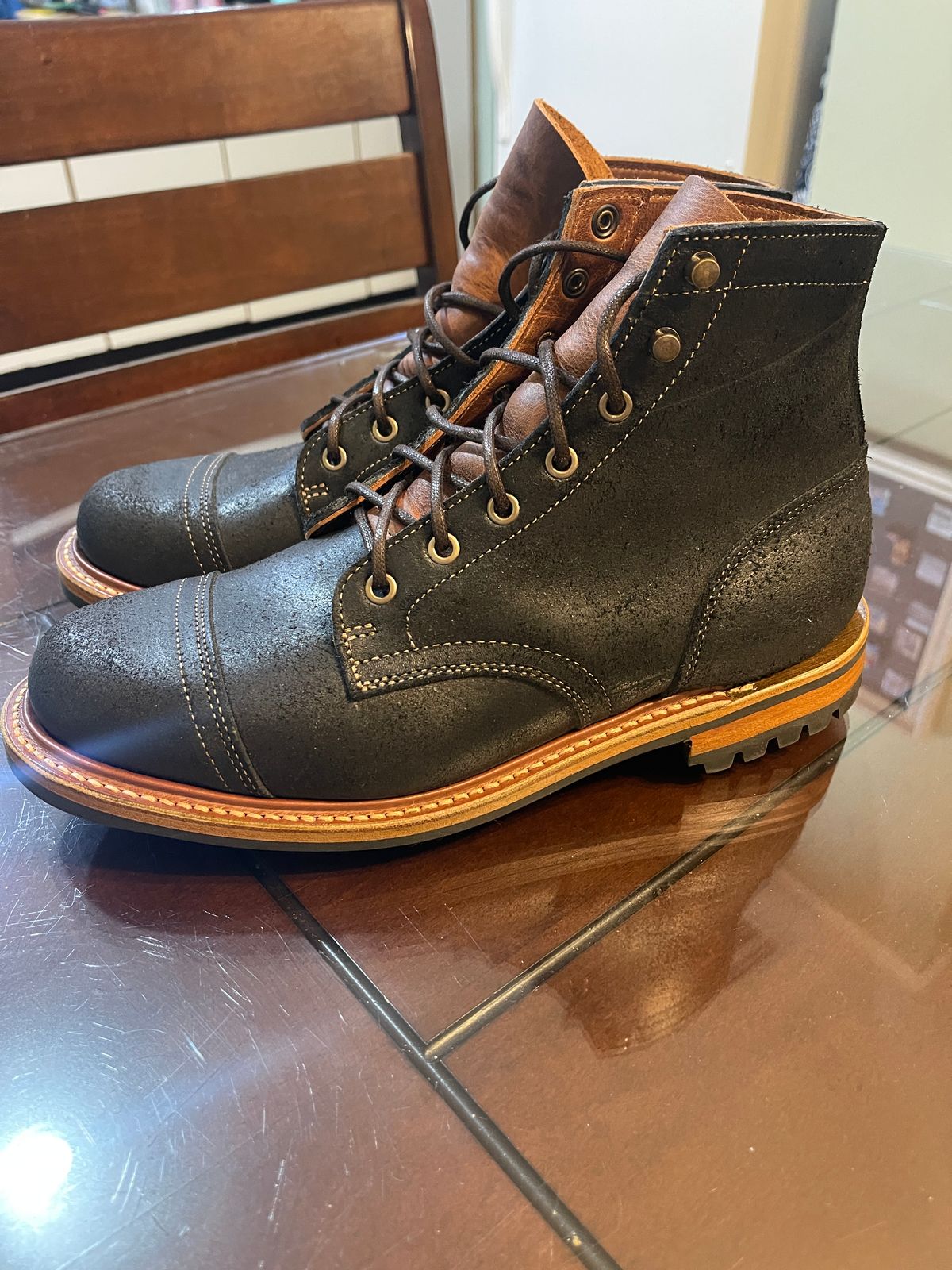 Photo by MRivera4396 on December 31, 2024 of the Truman Cap Toe Boot in Black Oiled Roughout.