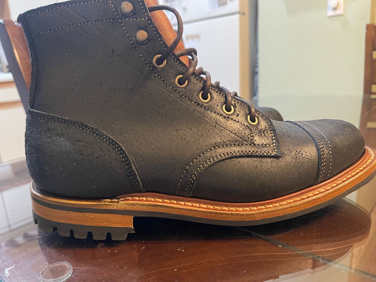 Photo by MRivera4396 on December 31, 2024 of the Truman Cap Toe Boot in Black Oiled Roughout.