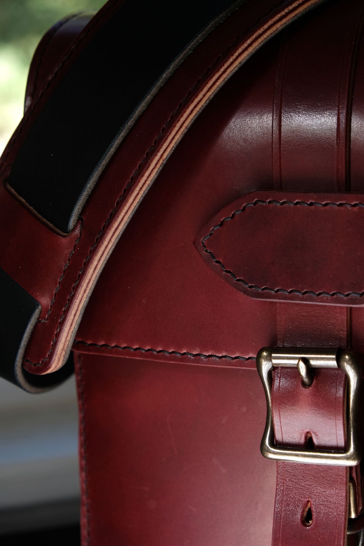 Photo by morosoleatherworks on November 5, 2025 of the Moroso Leatherworks Messenger Bag in Wickett & Craig Burgundy Burnt Harness & Wickett & Craig Black Milled Traditional Harness.