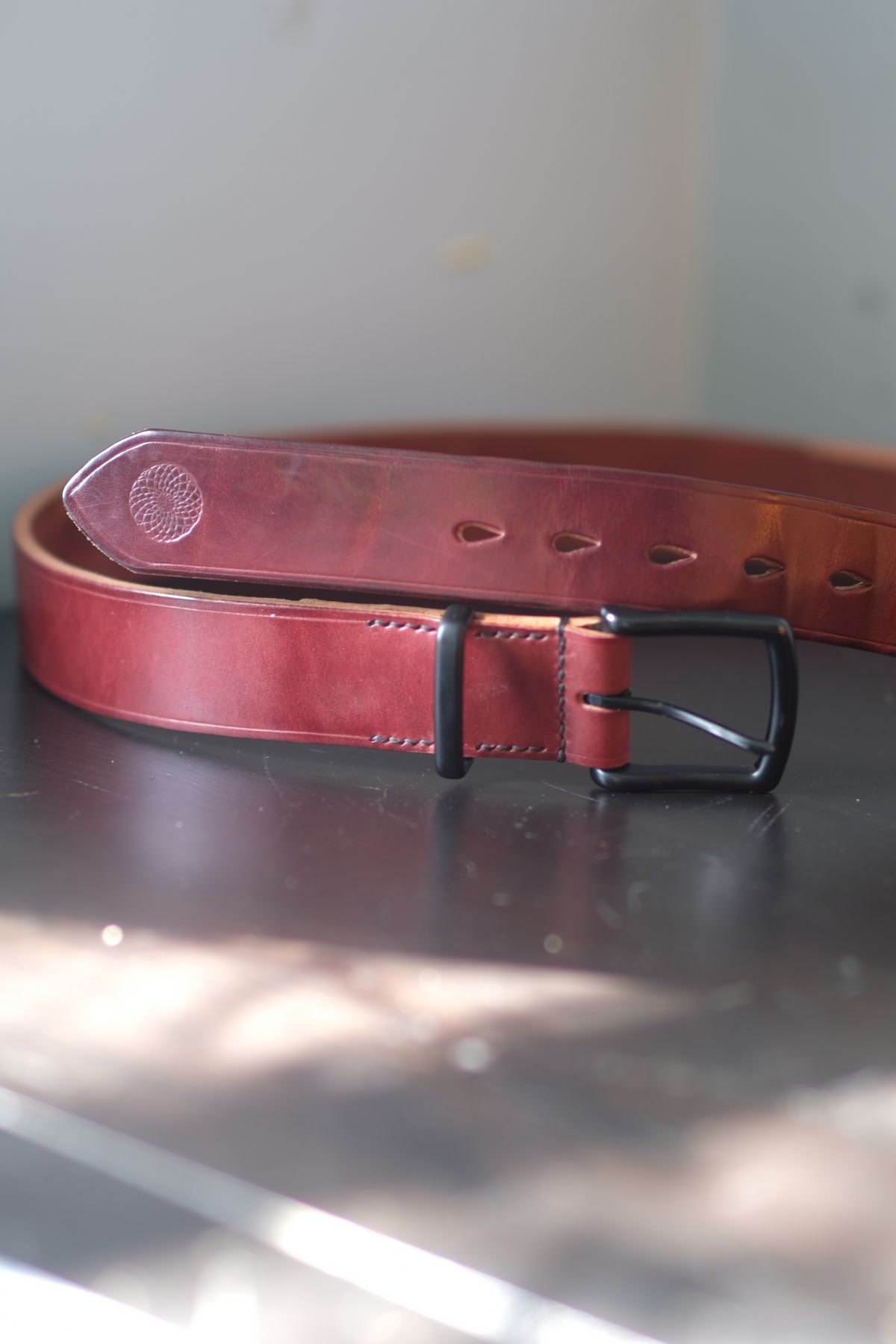 Photo by morosoleatherworks on April 4, 2026 of the Moroso Leatherworks Messenger Bag in Wickett & Craig Burgundy Burnt Harness & Wickett & Craig Black Milled Traditional Harness.