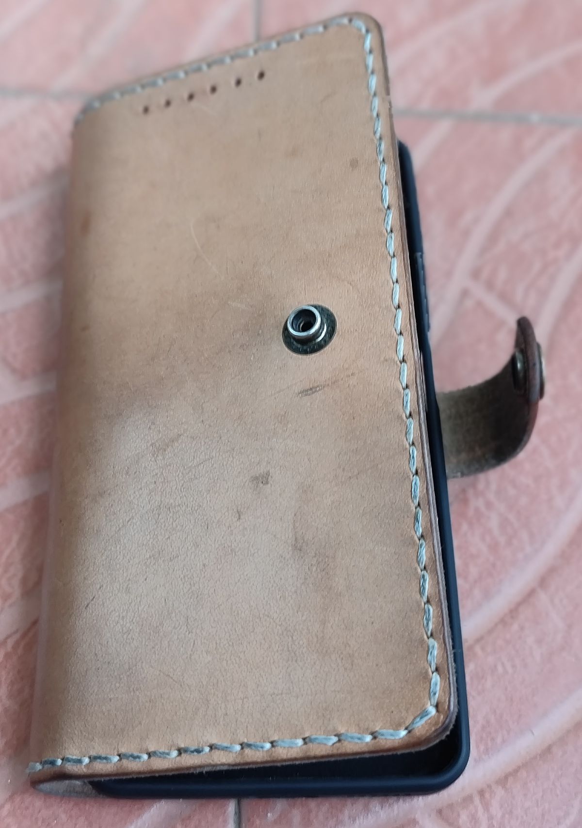 Photo by altobuff on November 4, 2025 of the North Harbour Redmi Note Phone Case With Flip Cover in Unknown Natural Veg Tan.