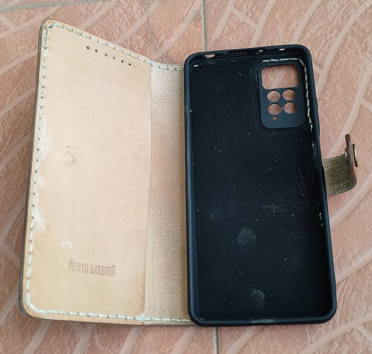 Photo by altobuff on November 4, 2025 of the North Harbour Redmi Note Phone Case With Flip Cover in Unknown Natural Veg Tan.