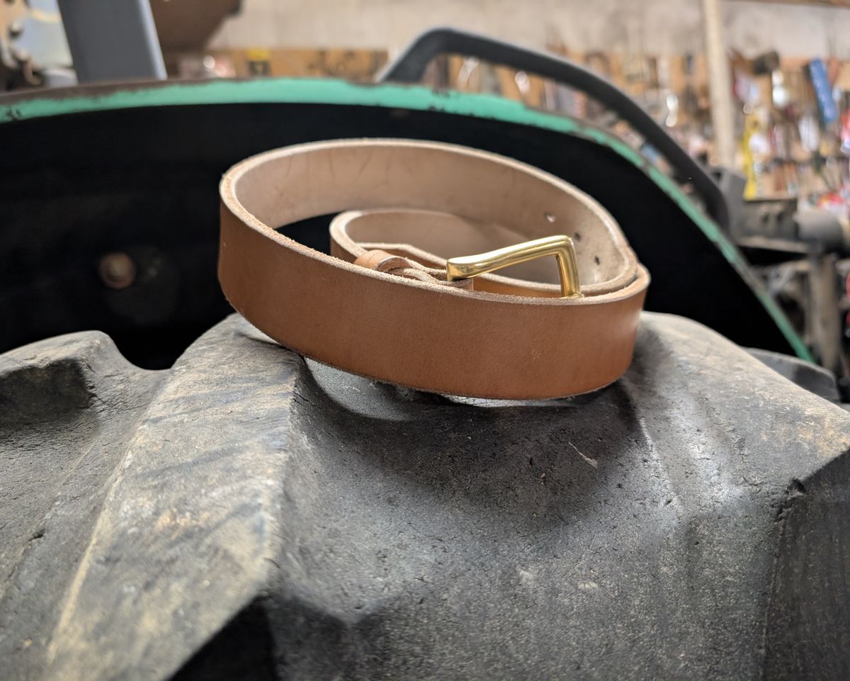 Photo by Lazy_Spread on January 4, 2026 of the Carmine Jack Leather 2025 Thunderdome Natural Shipyard Belt in J&FJ Baker Natural Oak Bark Bridle.
