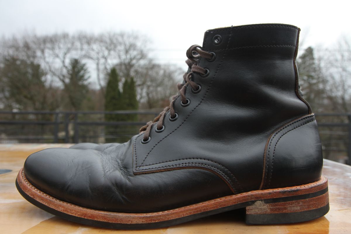 Photo by foot.siebitch on December 3, 2022 of the Oak Street Bootmakers Trench Boot in Horween Black Chromexcel.