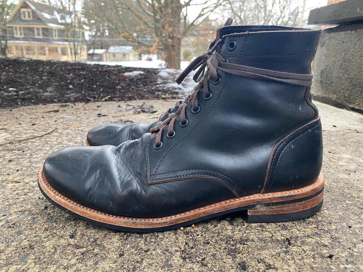 Photo by foot.siebitch on January 2, 2023 of the Oak Street Bootmakers Trench Boot in Horween Black Chromexcel.