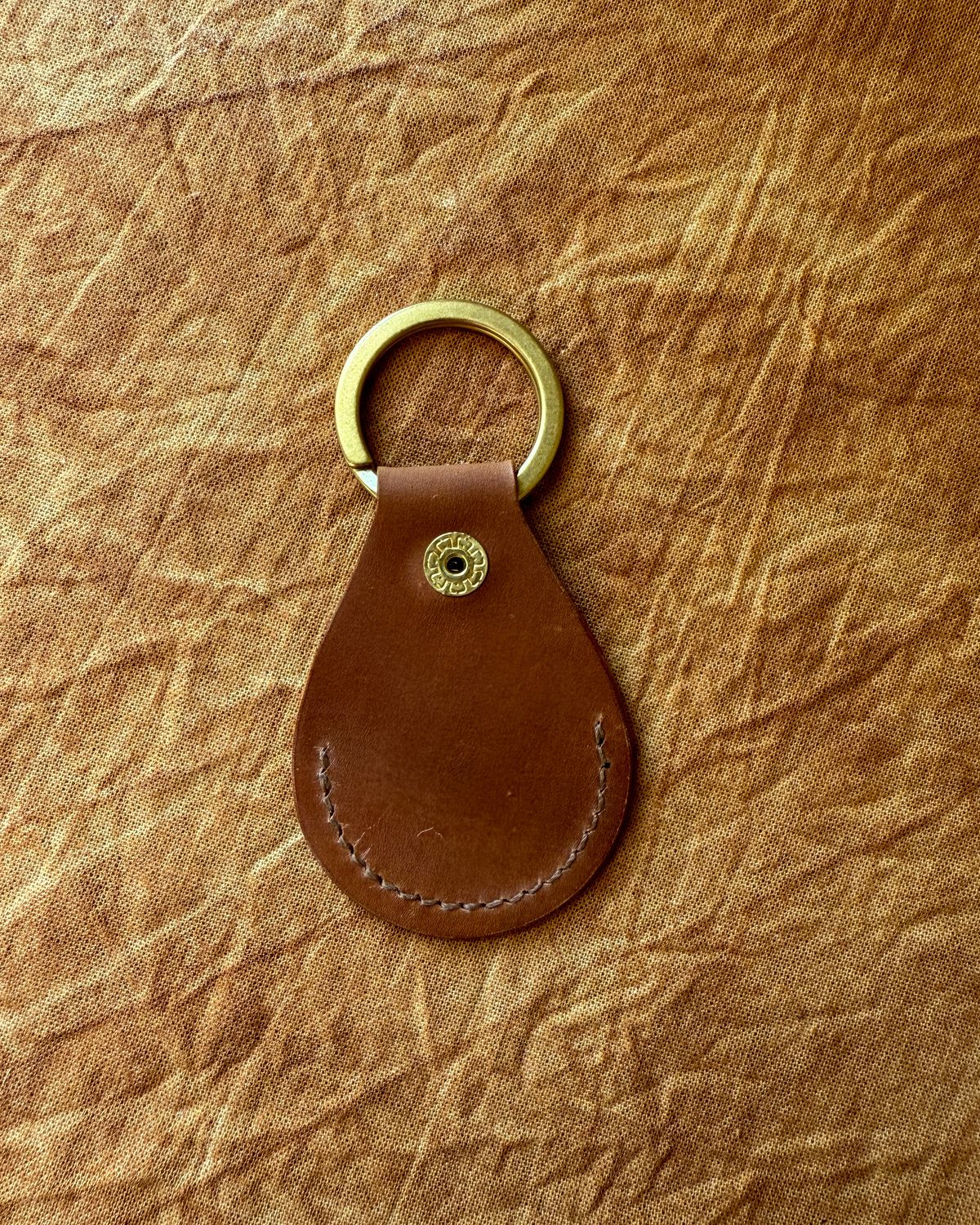 Photo by titletowngoods on October 5, 2025 of the Titletown Goods Airtag Case in Horween Unglazed Natural Shell Cordovan.