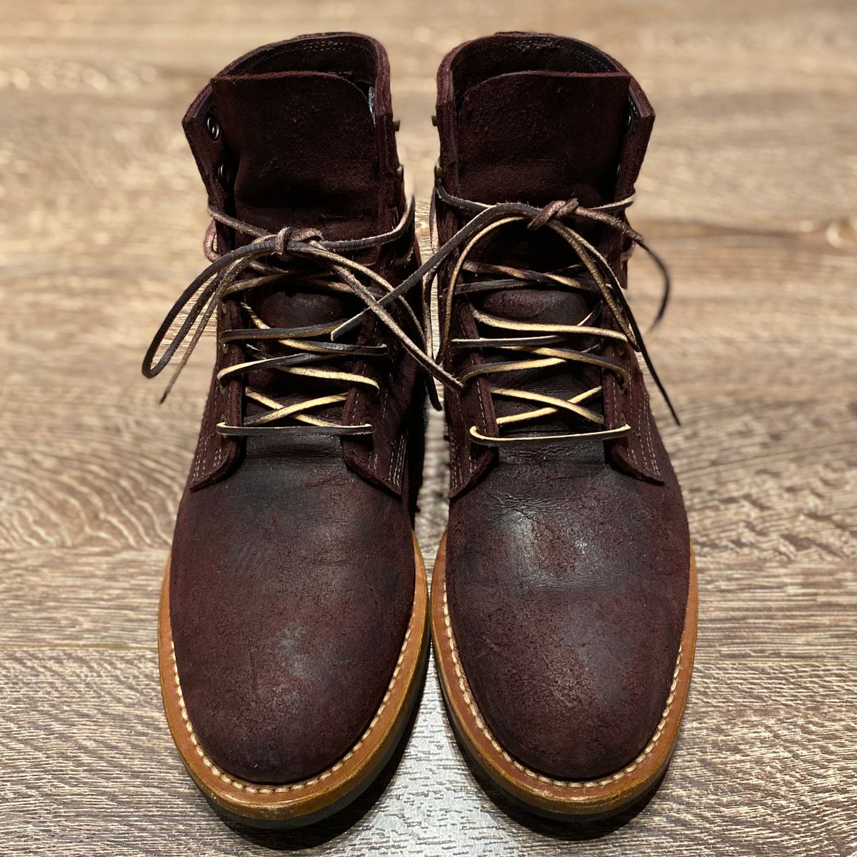 Photo by miguel__dominic on January 6, 2026 of the Truman Plain Toe Boot in C.F. Stead Garnet Rambler.