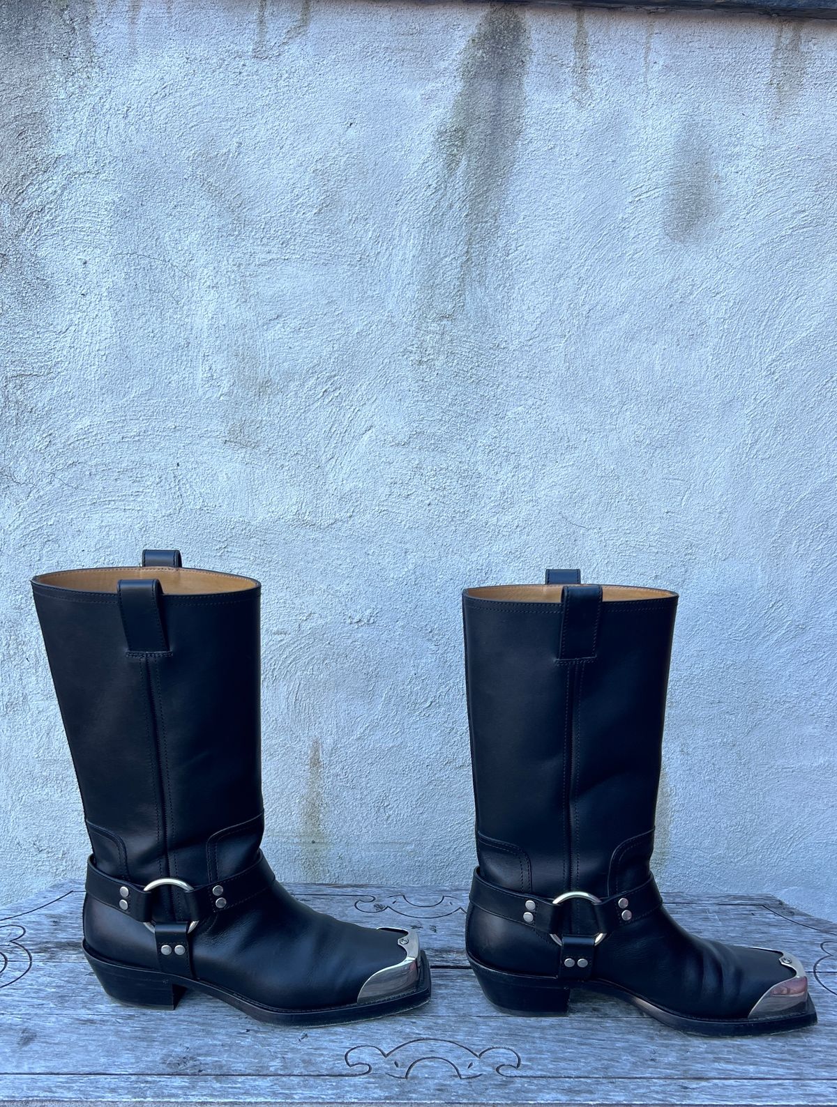 Photo by dring on January 5, 2024 of the Gucci Harness Boots in Black Calf.