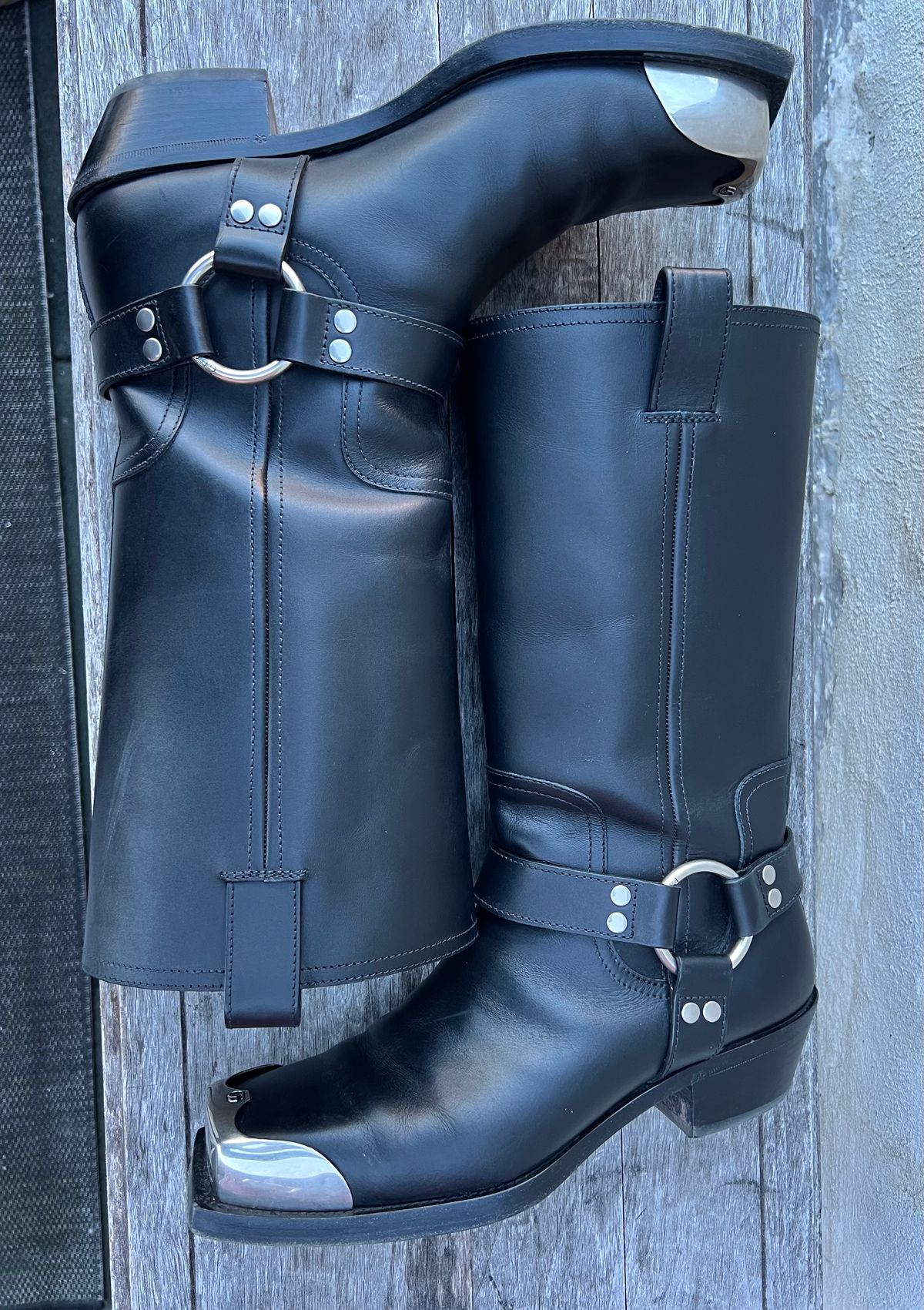 Photo by dring on February 4, 2024 of the Gucci Harness Boots in Black Calf.