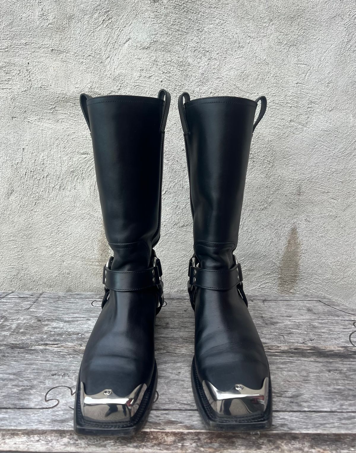 Photo by dring on April 3, 2024 of the Gucci Harness Boots in Black Calf.