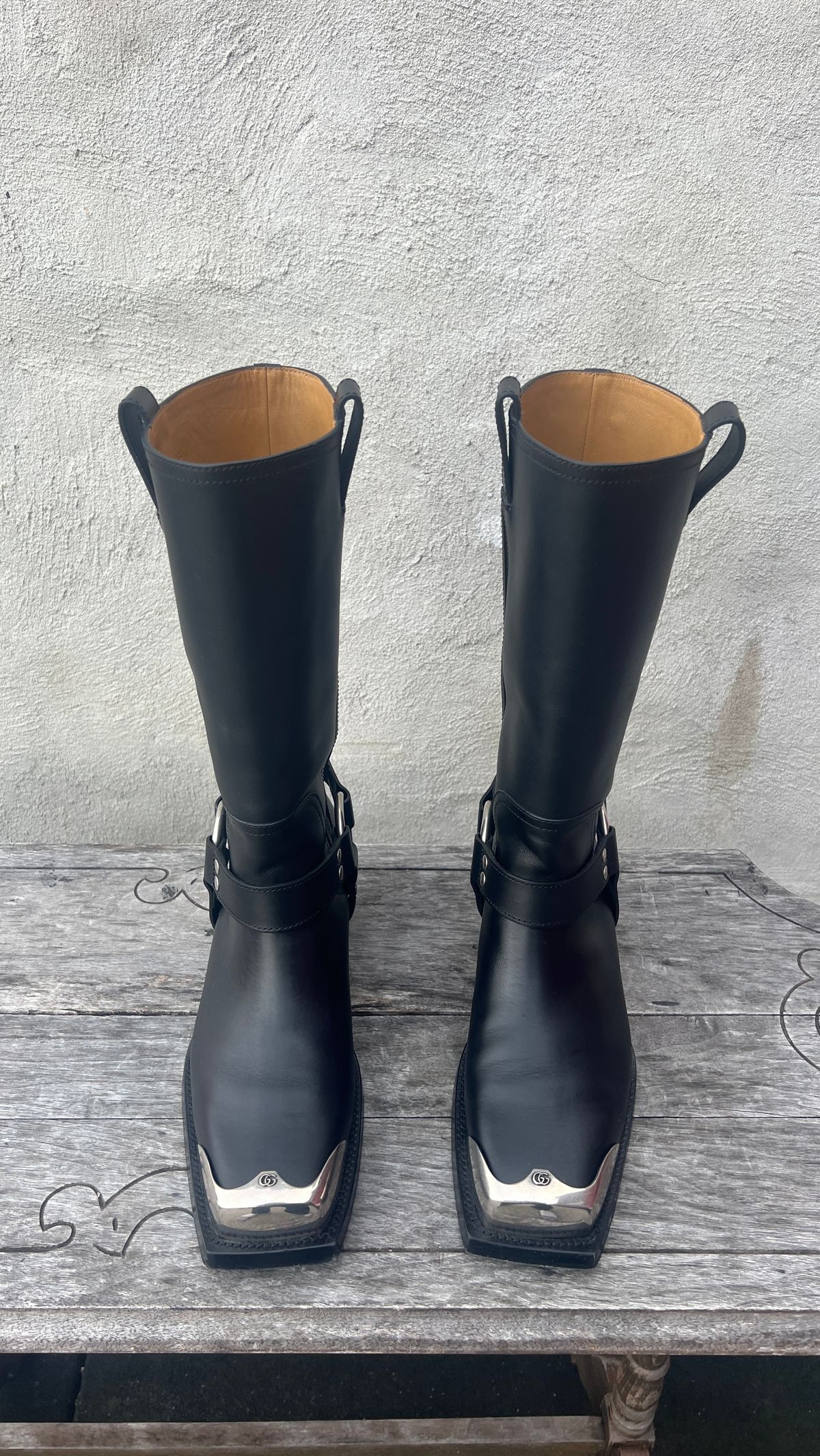 Photo by dring on December 5, 2023 of the Gucci Harness Boots in Black Calf.