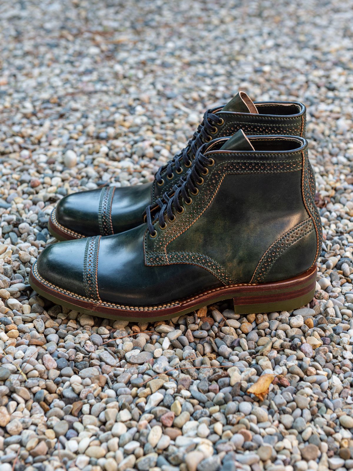 Photo by weathered.hide on October 2, 2022 of the Flame Panda Brogue Cap Toe Service Boot in Horween Marbled Black Shell Cordovan.