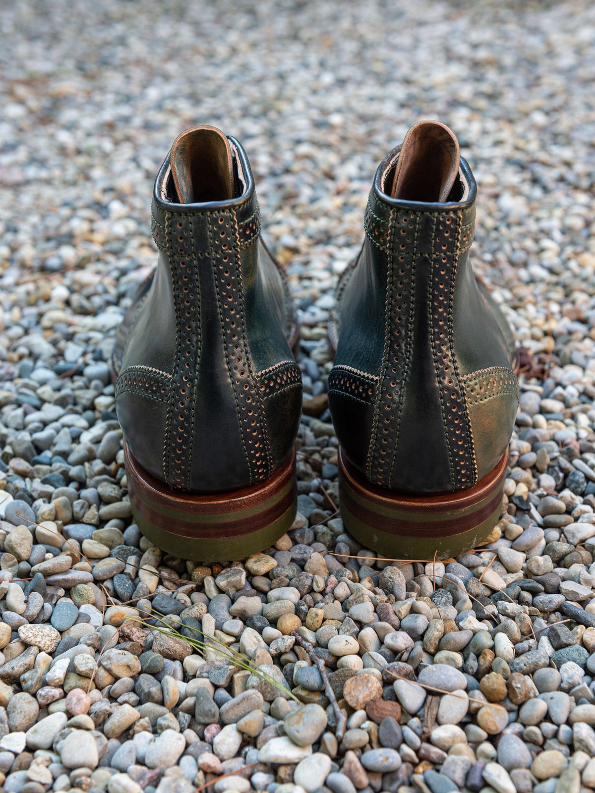 Photo by weathered.hide on October 2, 2022 of the Flame Panda Brogue Cap Toe Service Boot in Horween Marbled Black Shell Cordovan.