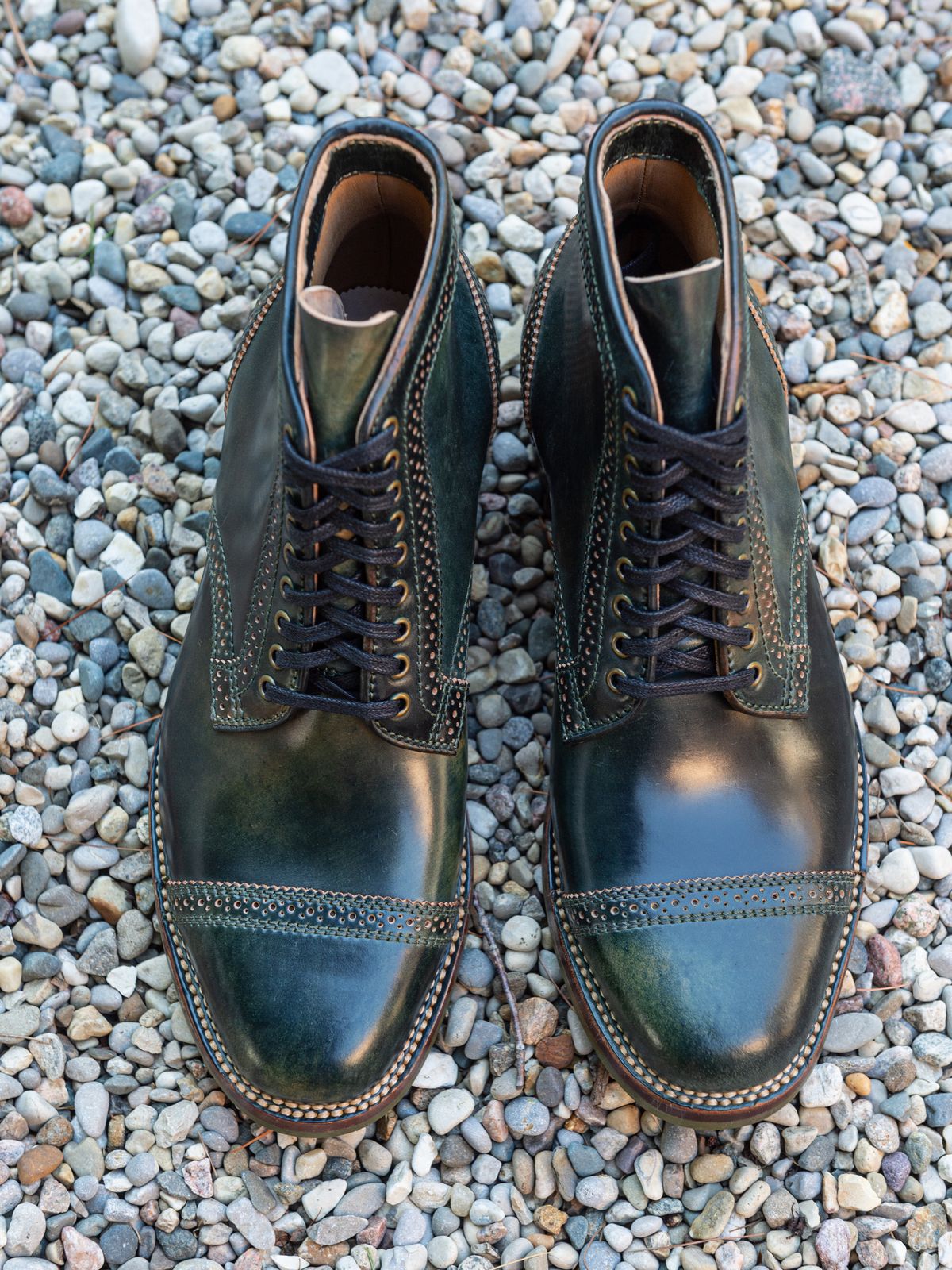 Photo by weathered.hide on October 2, 2022 of the Flame Panda Brogue Cap Toe Service Boot in Horween Marbled Black Shell Cordovan.