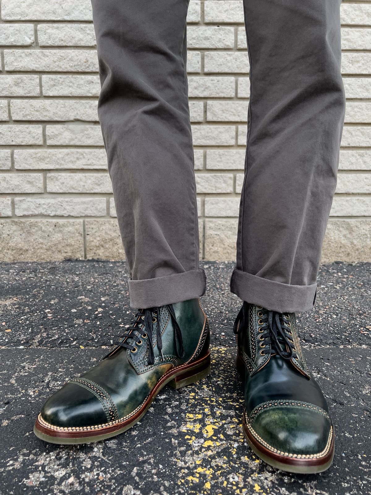 Photo by weathered.hide on October 5, 2022 of the Flame Panda Brogue Cap Toe Service Boot in Horween Marbled Black Shell Cordovan.