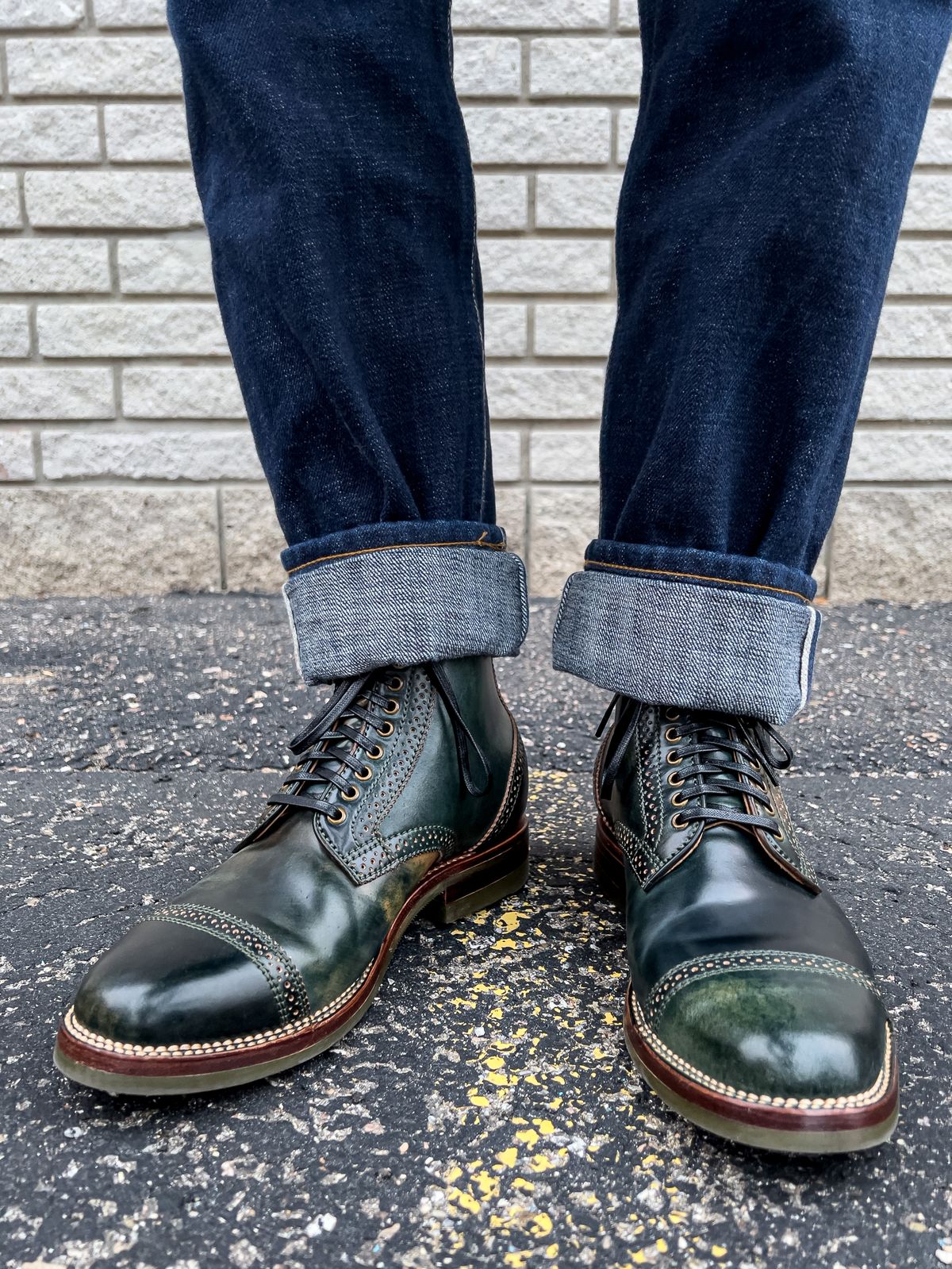 Photo by weathered.hide on October 7, 2022 of the Flame Panda Brogue Cap Toe Service Boot in Horween Marbled Black Shell Cordovan.