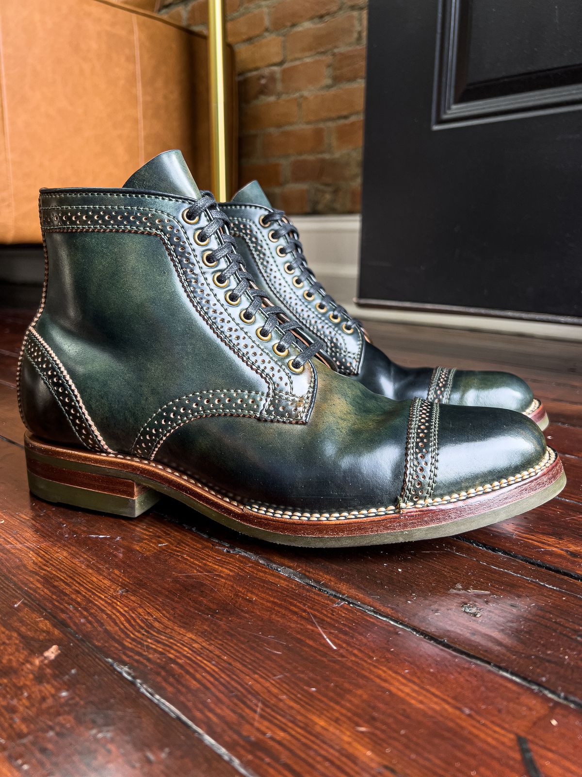 Photo by weathered.hide on November 5, 2022 of the Flame Panda Brogue Cap Toe Service Boot in Horween Marbled Black Shell Cordovan.