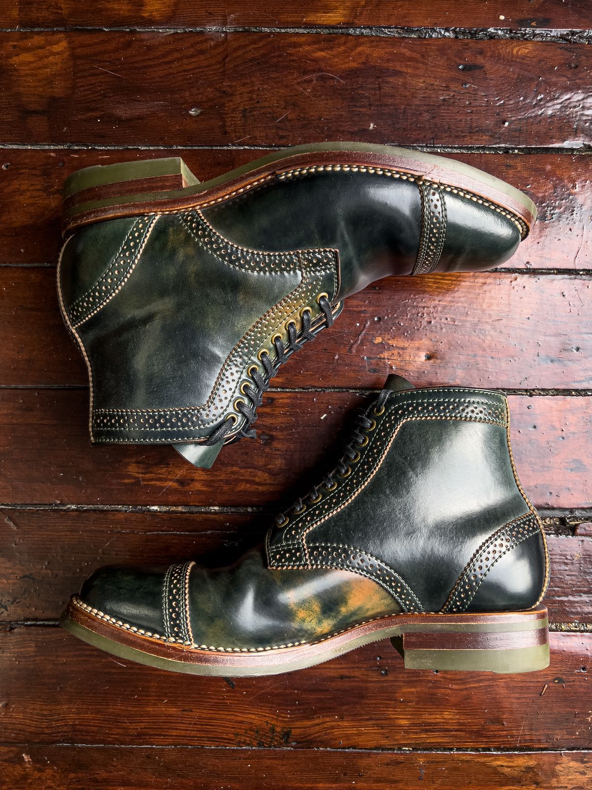 Photo by weathered.hide on November 5, 2022 of the Flame Panda Brogue Cap Toe Service Boot in Horween Marbled Black Shell Cordovan.