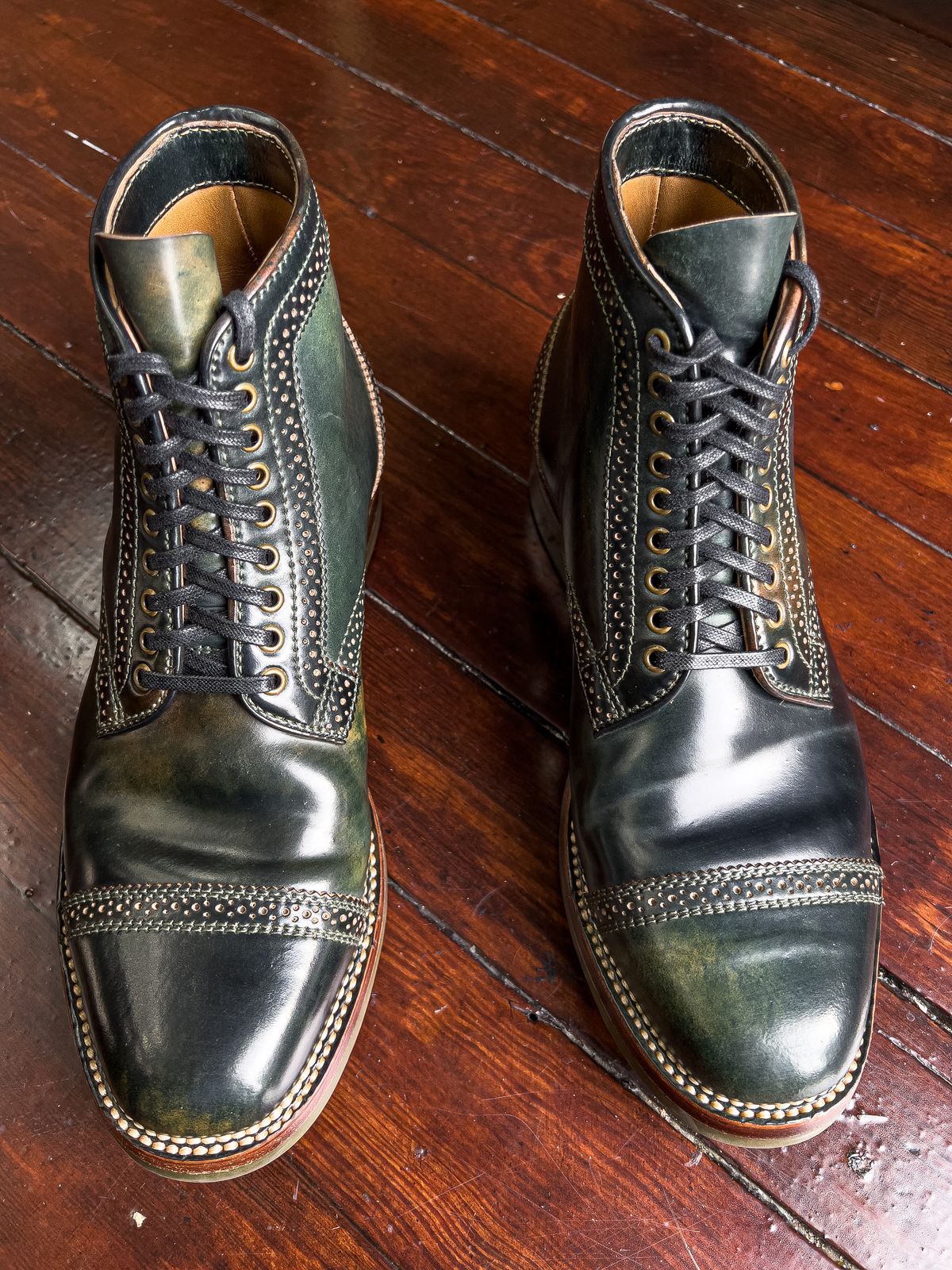 Photo by weathered.hide on November 5, 2022 of the Flame Panda Brogue Cap Toe Service Boot in Horween Marbled Black Shell Cordovan.