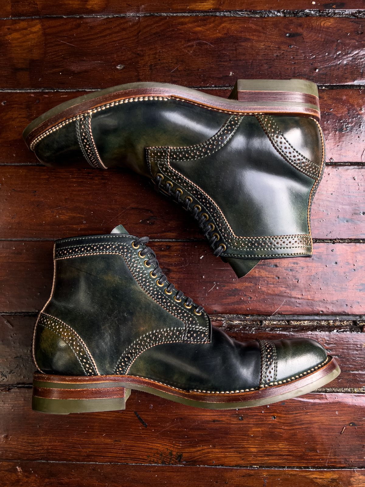Photo by weathered.hide on November 5, 2022 of the Flame Panda Brogue Cap Toe Service Boot in Horween Marbled Black Shell Cordovan.
