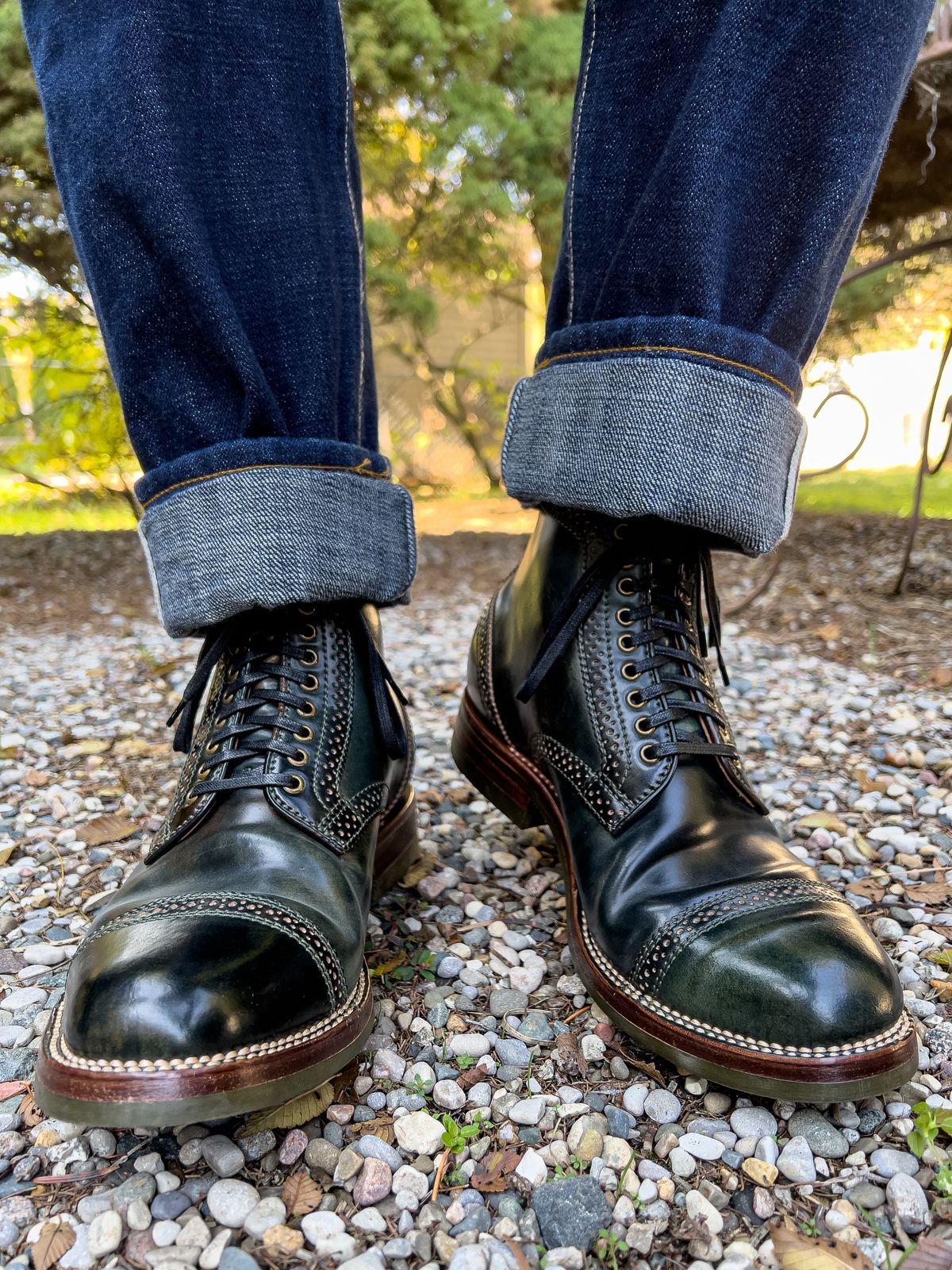 Photo by weathered.hide on November 3, 2022 of the Flame Panda Brogue Cap Toe Service Boot in Horween Marbled Black Shell Cordovan.