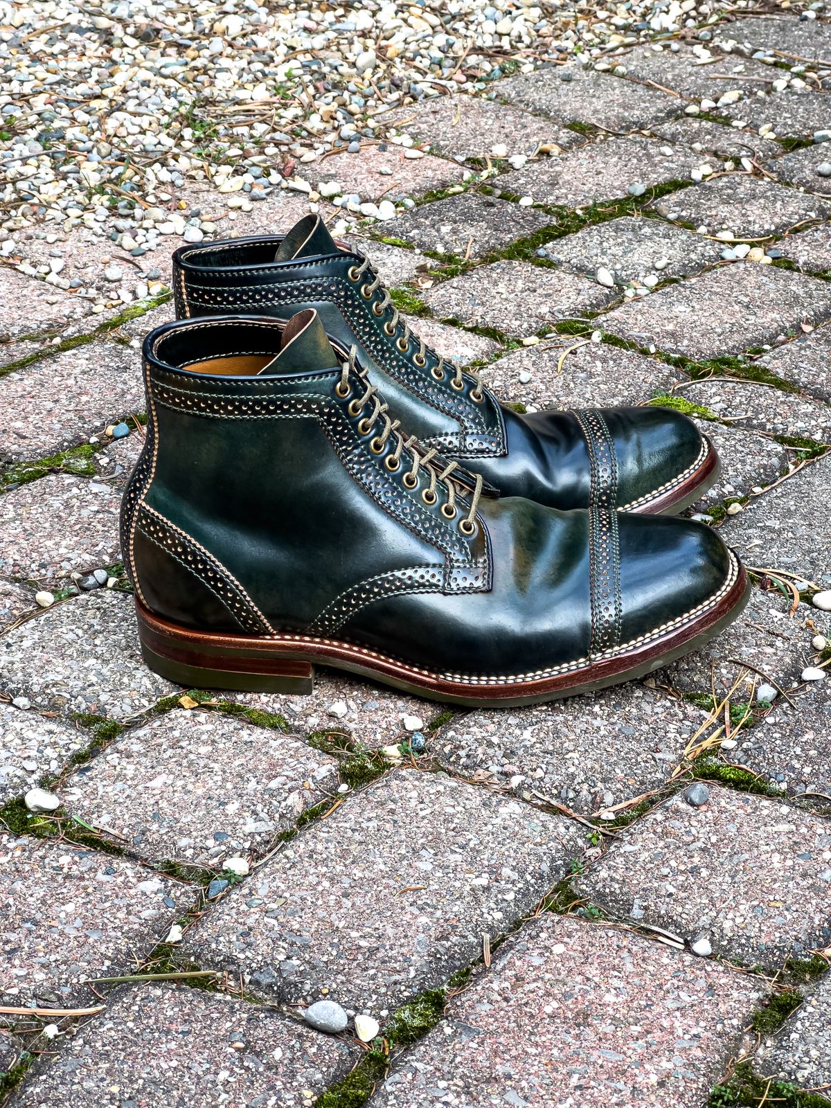 Photo by weathered.hide on December 6, 2022 of the Flame Panda Brogue Cap Toe Service Boot in Horween Marbled Black Shell Cordovan.