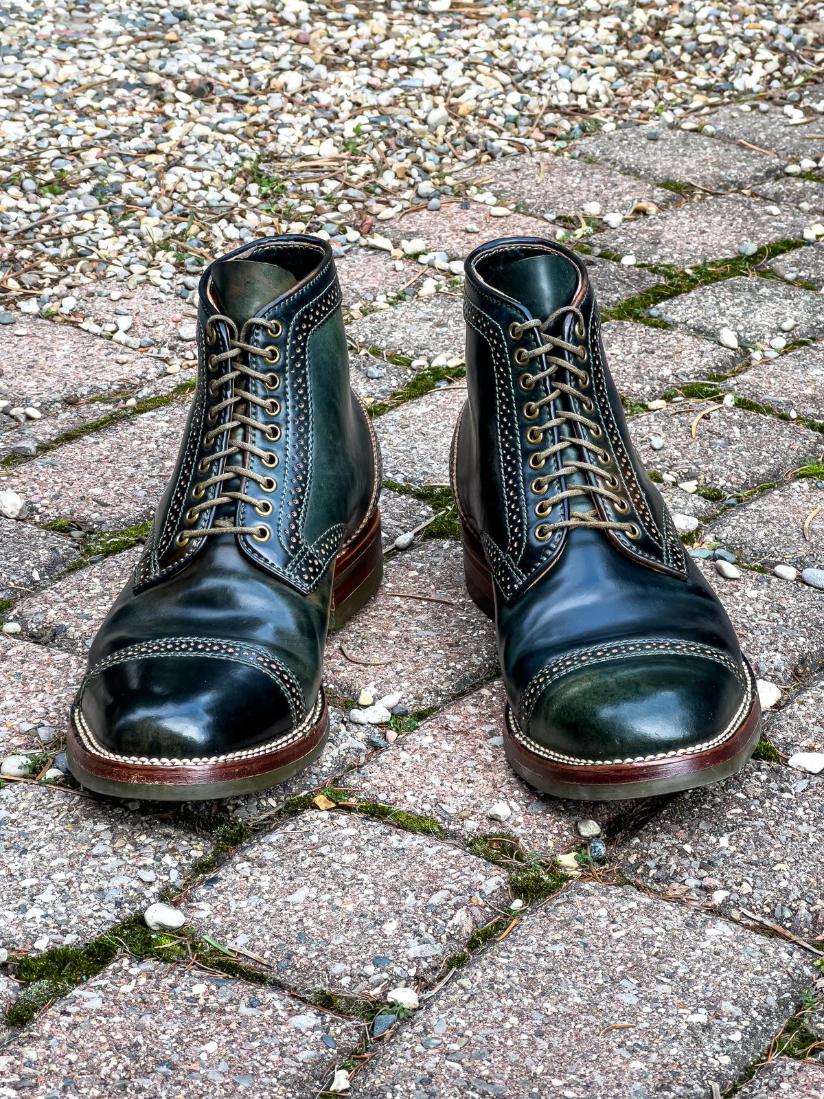 Photo by weathered.hide on December 6, 2022 of the Flame Panda Brogue Cap Toe Service Boot in Horween Marbled Black Shell Cordovan.