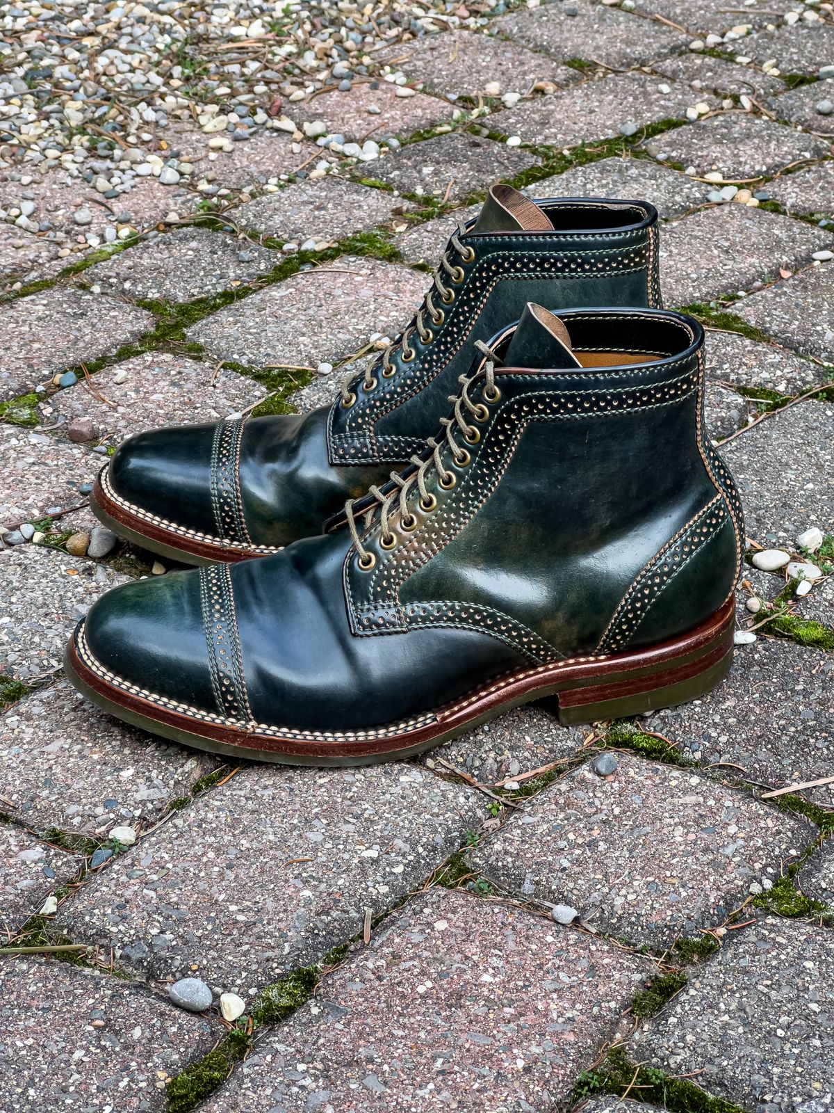 Photo by weathered.hide on December 6, 2022 of the Flame Panda Brogue Cap Toe Service Boot in Horween Marbled Black Shell Cordovan.