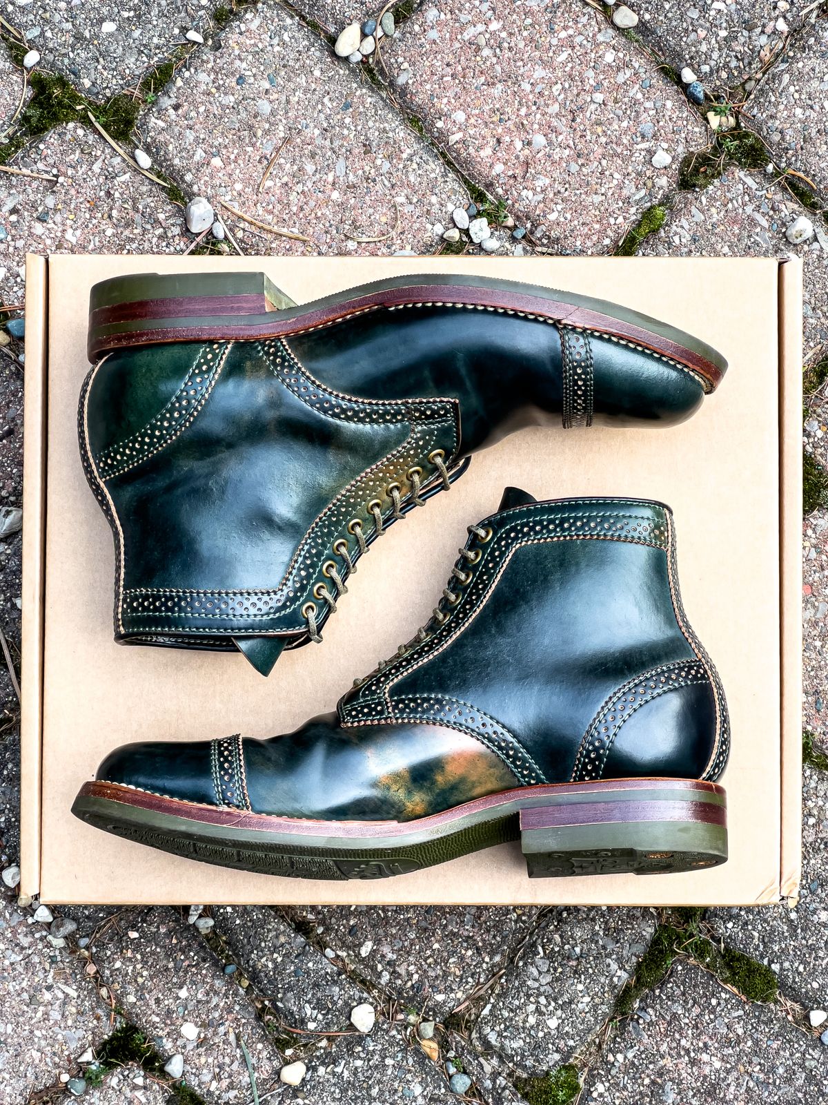 Photo by weathered.hide on December 6, 2022 of the Flame Panda Brogue Cap Toe Service Boot in Horween Marbled Black Shell Cordovan.