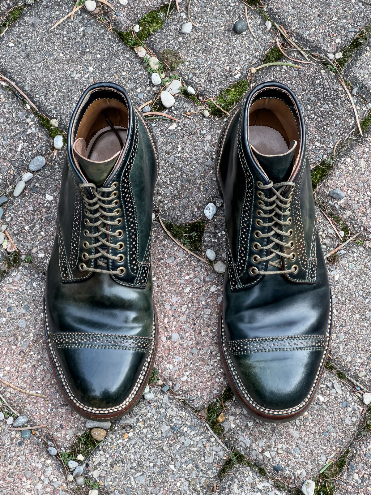 Photo by weathered.hide on December 6, 2022 of the Flame Panda Brogue Cap Toe Service Boot in Horween Marbled Black Shell Cordovan.