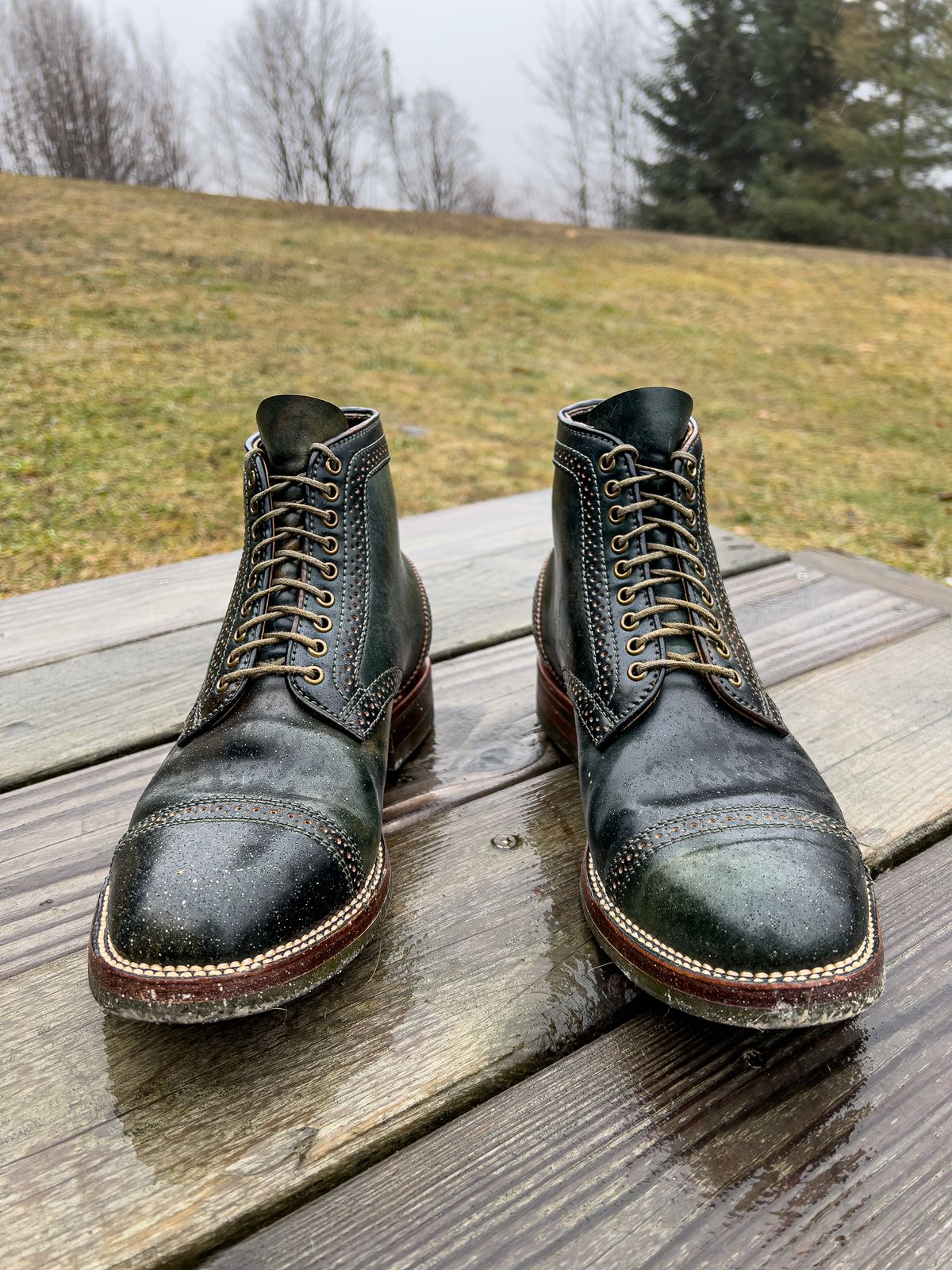 Photo by weathered.hide on January 6, 2023 of the Flame Panda Brogue Cap Toe Service Boot in Horween Marbled Black Shell Cordovan.