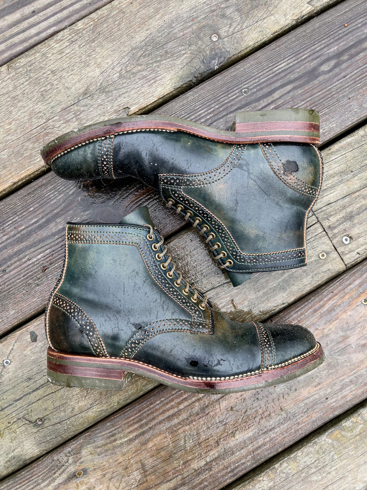 Photo by weathered.hide on January 6, 2023 of the Flame Panda Brogue Cap Toe Service Boot in Horween Marbled Black Shell Cordovan.