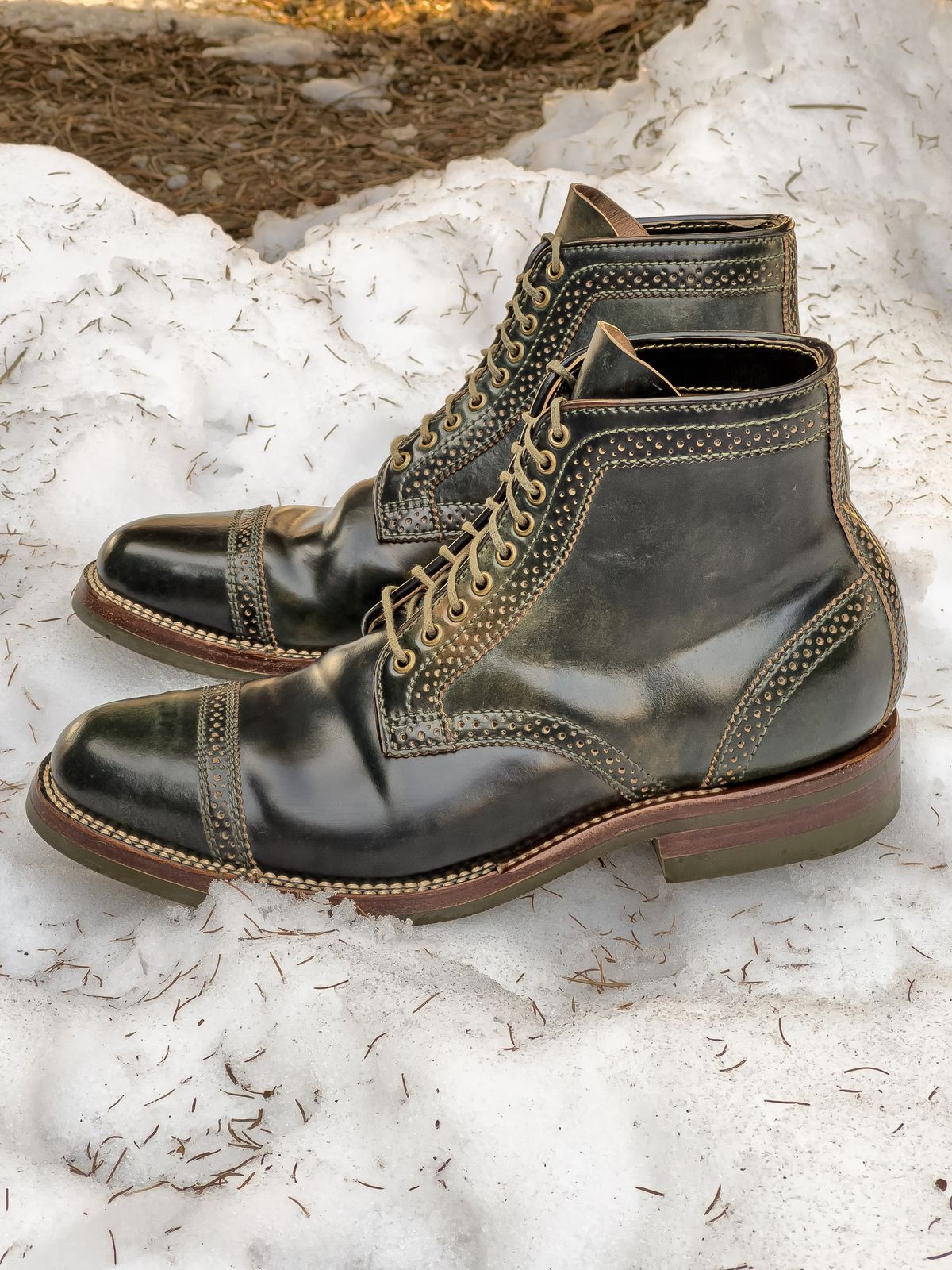 Photo by weathered.hide on February 6, 2023 of the Flame Panda Brogue Cap Toe Service Boot in Horween Marbled Black Shell Cordovan.