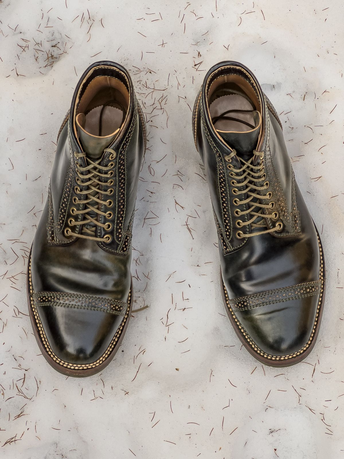 Photo by weathered.hide on February 6, 2023 of the Flame Panda Brogue Cap Toe Service Boot in Horween Marbled Black Shell Cordovan.