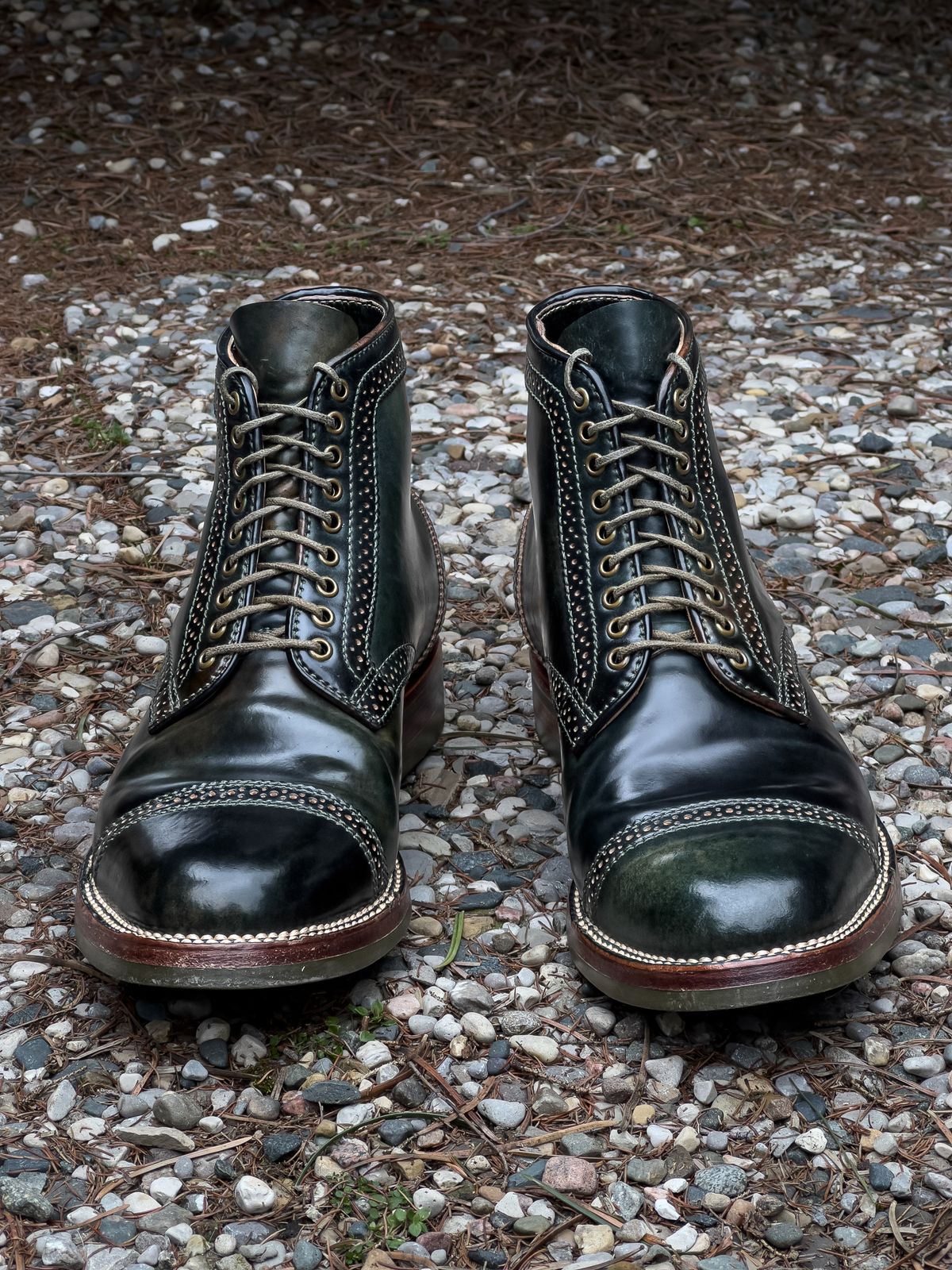 Photo by weathered.hide on March 5, 2023 of the Flame Panda Brogue Cap Toe Service Boot in Horween Marbled Black Shell Cordovan.